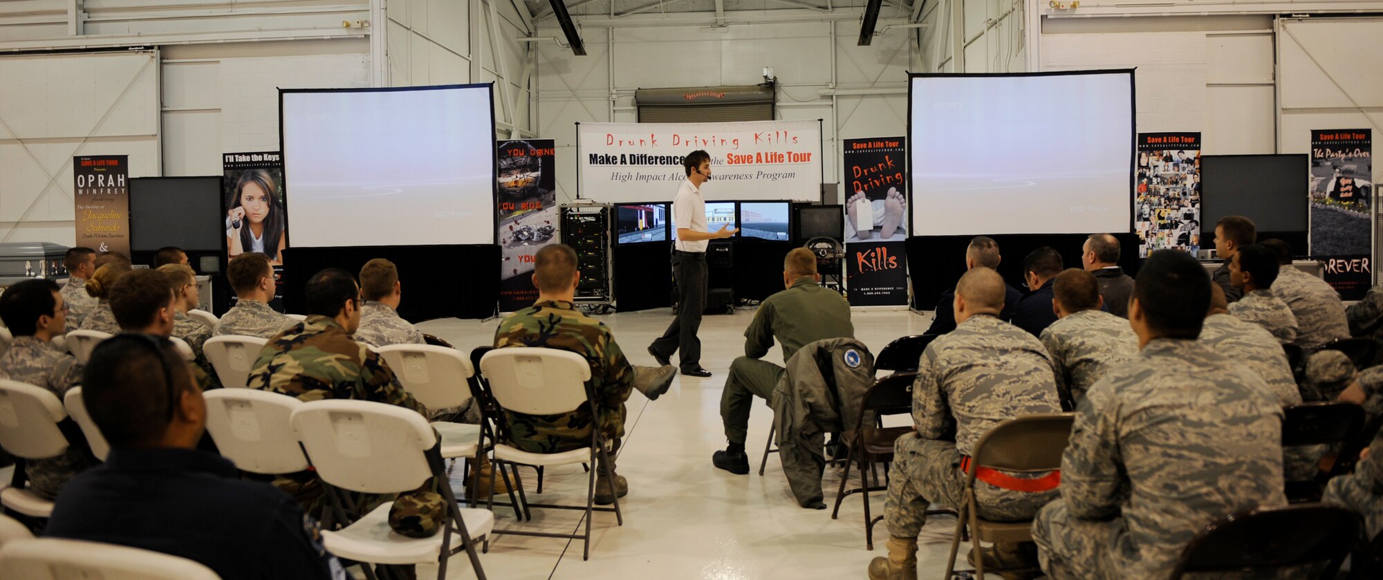MOUNTAIN HOME AIR FORC EBASE, Idaho -- Chris Geysbeer, manager and speaker of the Save a Life Tour, talks to Airmen here about the consequences of drunk driving Oct. 19. The Save a Life Tour is an alcohol-awareness program designed to educate people about the dangers associated with drinking and driving. The presentation started with a 15 minute video showing real life tragedies. Gunfighters then got a chance to sit in a drunk-driving simulator, which attempts to replicate the sensation of being intoxicated behind the wheel. (U.S. Air Force photo by Airman 1st Class Renishia Richardson)