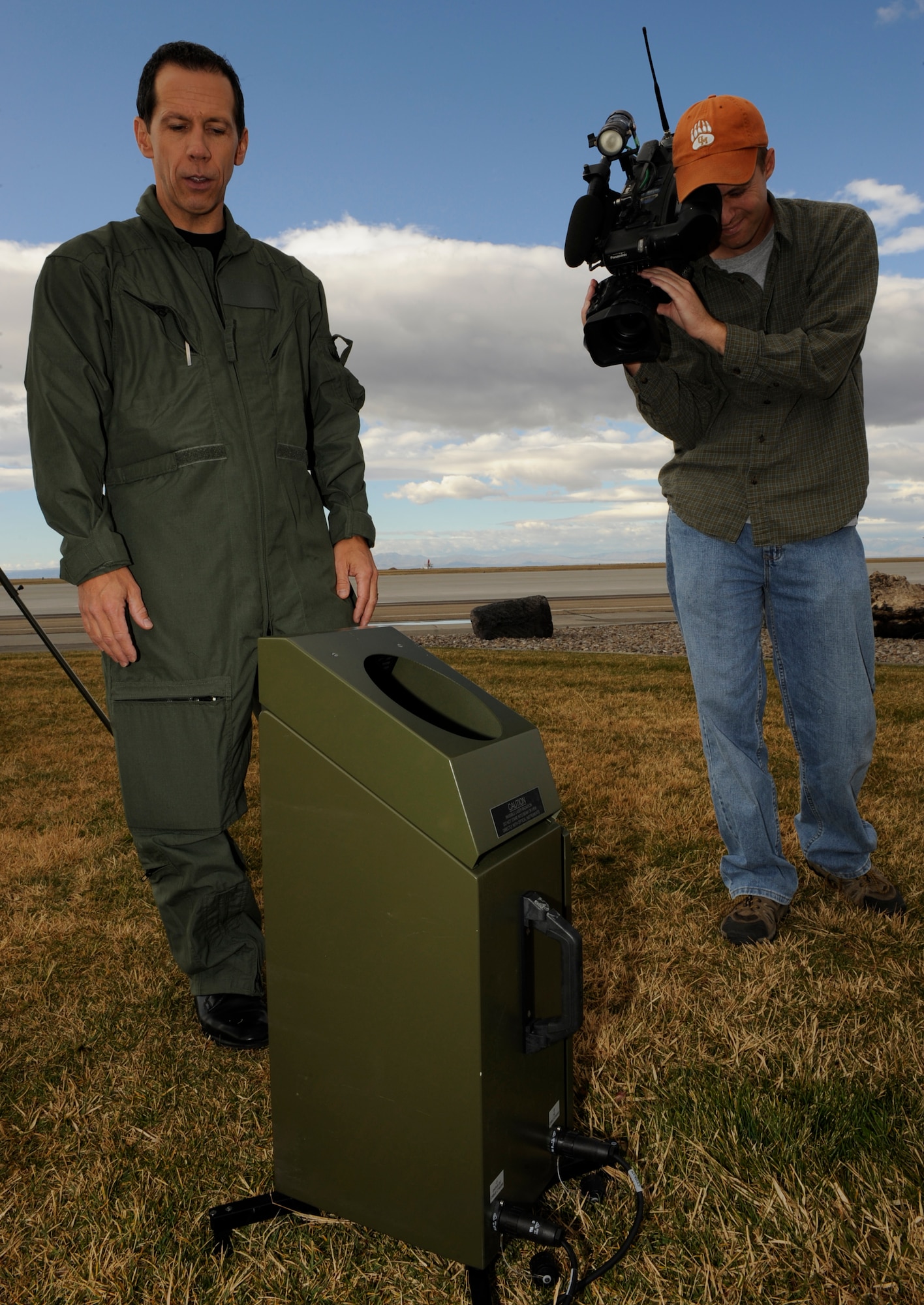 MOUNTAIN HOME AIR FORCE BASE, Idaho-- Scott Dorval, KIVI-TV (Boise Ch. 6) chief meteorologist, examines a Tactical Meteorological Observation System during his visit to the 366th Operations Support Squadron weather flight Oct. 14. Mr. Dorval visited the base to see how weather affects the base's flying missions. (U.S. Air Force photo by Airman 1st Class Renishia Richardson)