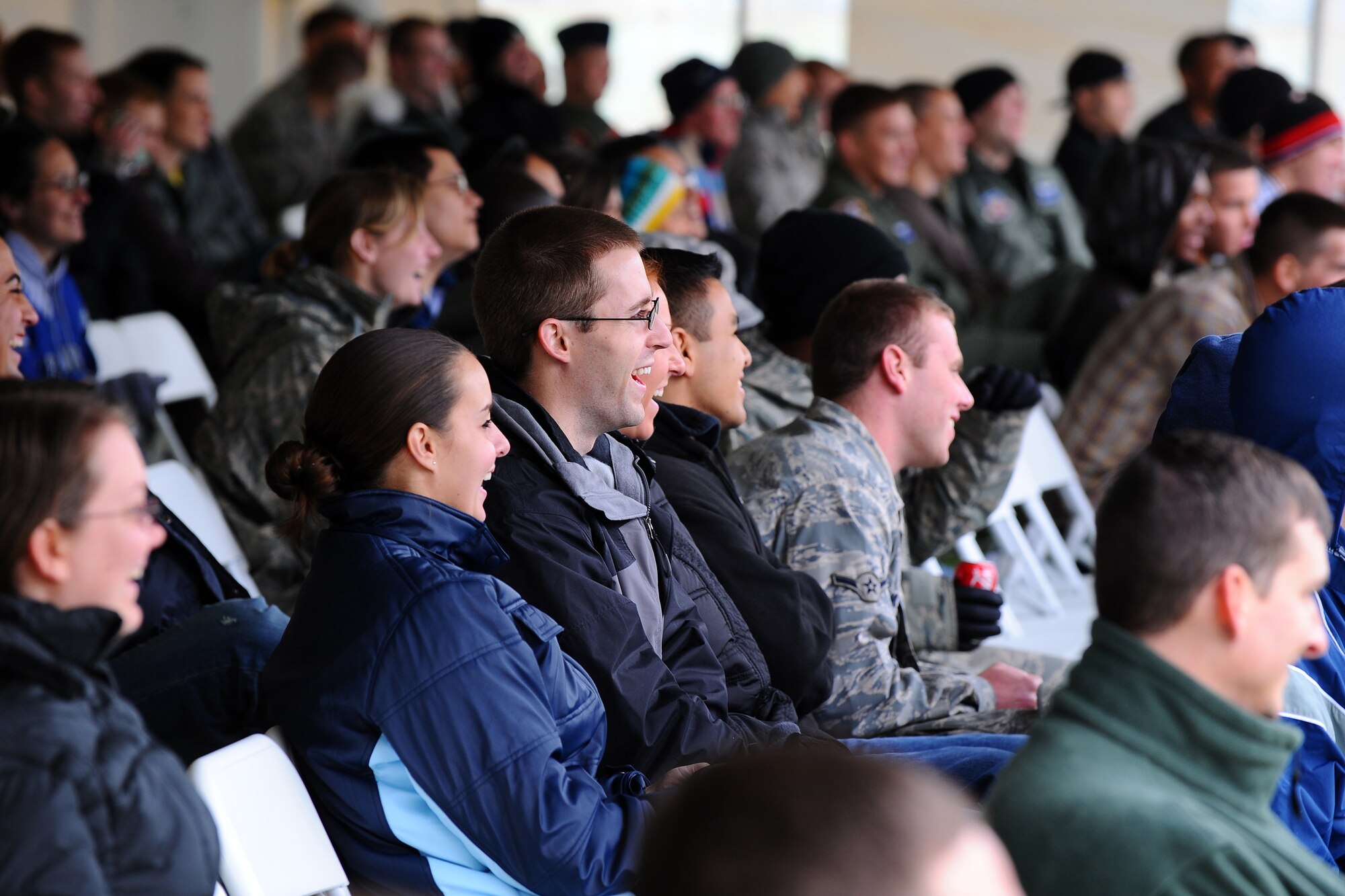 OFFUTT AIR FORCE BASE, Neb. - Offutt junior enlisted members enjoy a free comedy show at the base lake Oct. 16 in conjunction with Airman Appreciation Day.  The comedy show featured Sam Norton, Richard Reese and headliner D.T. Owens.

U.S. Air Force Photo by Josh Plueger