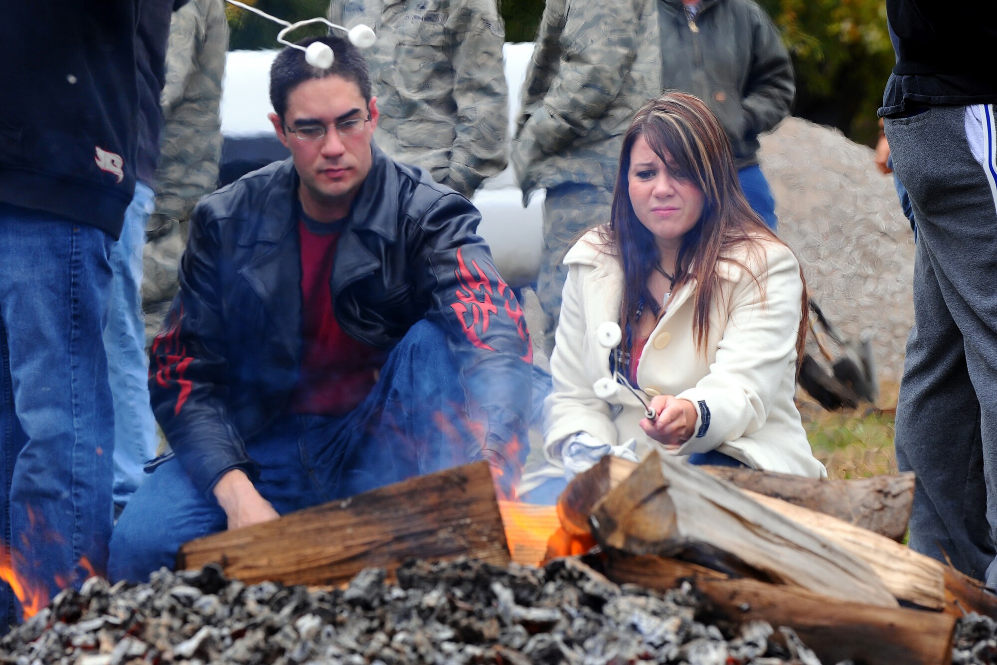 OFFUTT AIR FORCE BASE, Neb. - From left, Senior Airman David Leon and Airman 1st Class Jamie Cansler, both with the 55th Medical Group's radiology department, roast marshmallows at the base lake during Airman Appreciation Day Oct. 16.  The event included free hot dogs and hamburgers as well as hours of entertaiment by three comedians.

U.S. Air Force Photo by Josh Plueger