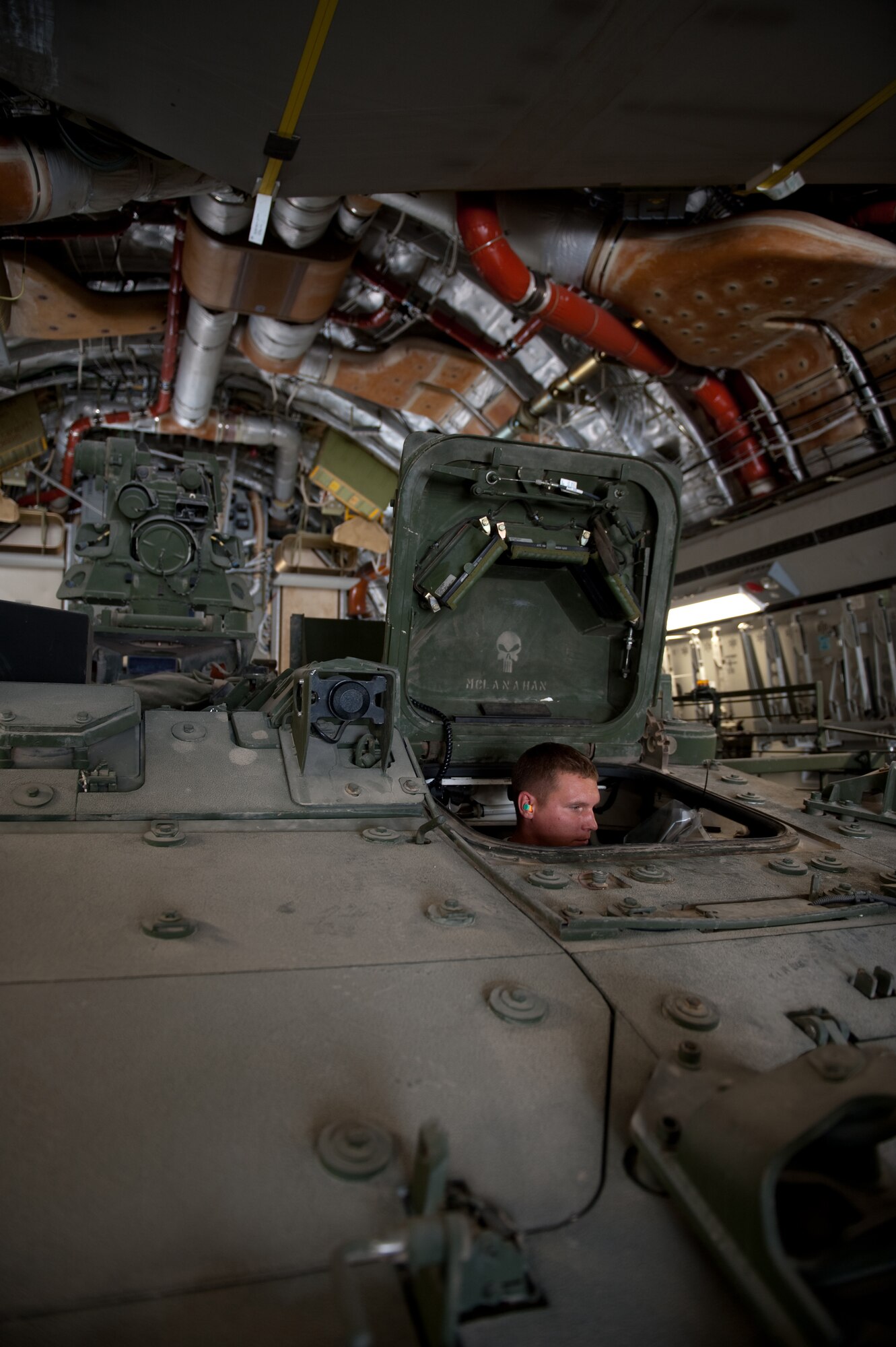 Senior Airman Daniel Webb, 8th Expeditionary Air Mobility Squadron, parks a Stryker M1126 Infantry Carrier Vehicle onto a C-17 Globemaster III, Oct. 17, 2009, in Southwest Asia. Airman Webb, along with fellow 8 EAMS ramp section members, help to load and unload all cargo, including Stryker ICVs, for local aircraft. Airman Webb is deployed from Altus Air Force Base, Okla., in support of operations Iraqi Freedom and Enduring Freedom. (U.S. Air Force photo/Staff Sgt. Robert Barney) 