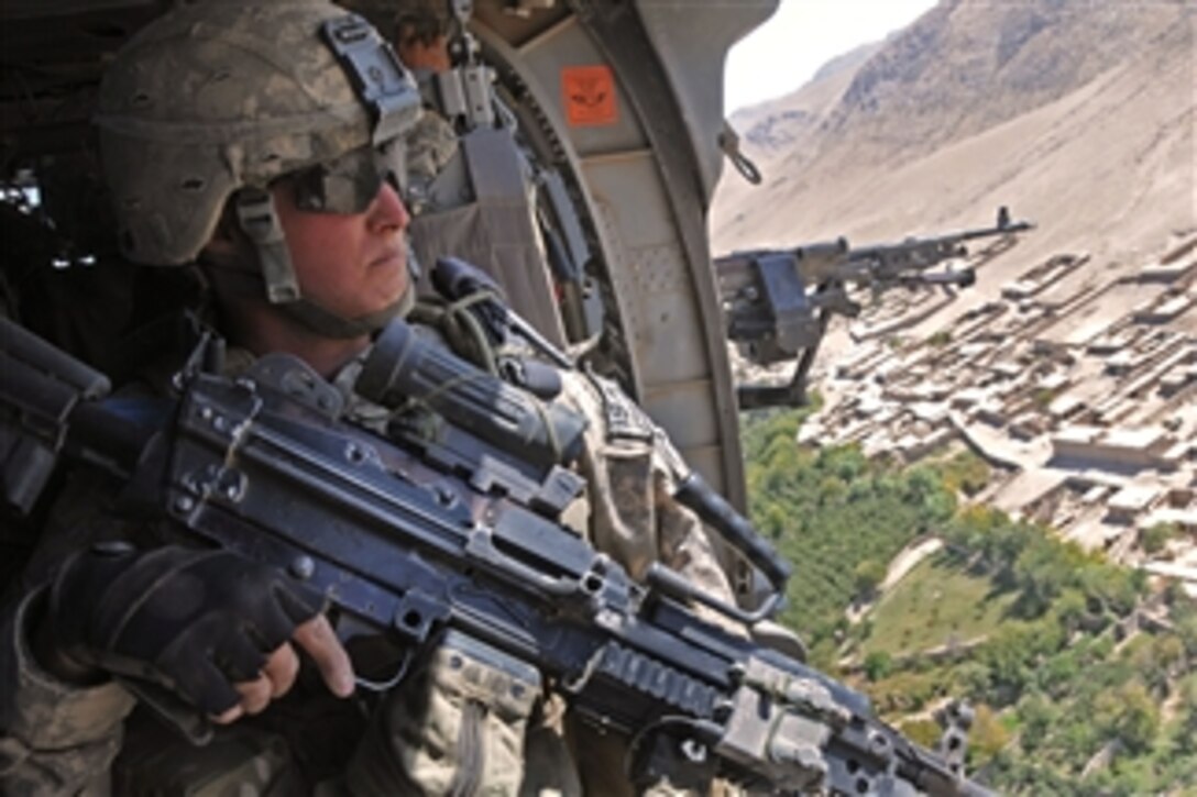 U.S. Army Spc. Slagle Justin returns to Forward Operating Base Lane from an air assault mission in Zabul Province, Afghanistan, on Oct. 15, 009.  Justin is a member of Alpha Company, 1st Battalion, 4th Infantry Regiment, United States Army Europe.  The unit is deployed throughout southern Afghanistan.  