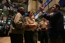 Public affairs Marines tour the New York Stock Exchange, Oct. 20, while attending the East Coast Media Symposium. The week-long workshop develops commanders’ confidence with on-camera interviews and provides them a chance to talk to national journalists about their embed experience. The symposium is designed to develop a more open relationship between Marine units and the press by talking to Marine leaders about the importance and role of the media. (Official Marine Corps photo by Sgt. Randall A. Clinton).