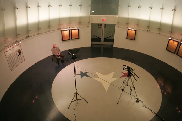 Col. Farrell Sullivan, Sergeant Maj. Charlie Stamford, sergeant major, 3rd Battalion, 8th Marine Regiment, II Marine Expeditionary Force, Camp Lejeune, N.C., looks into the video camera before beginning an on-camera live interview during a training exercise in New York.  Sullivan and leaders from Marine Corps units across the country came here for the 48th annual, weeklong, East Coast Media Symposium. This event brings together journalists and Marines for a discussion on creating a more open approach to the media. (Official Marine Corps photo by Sgt. Randall A. Clinton)