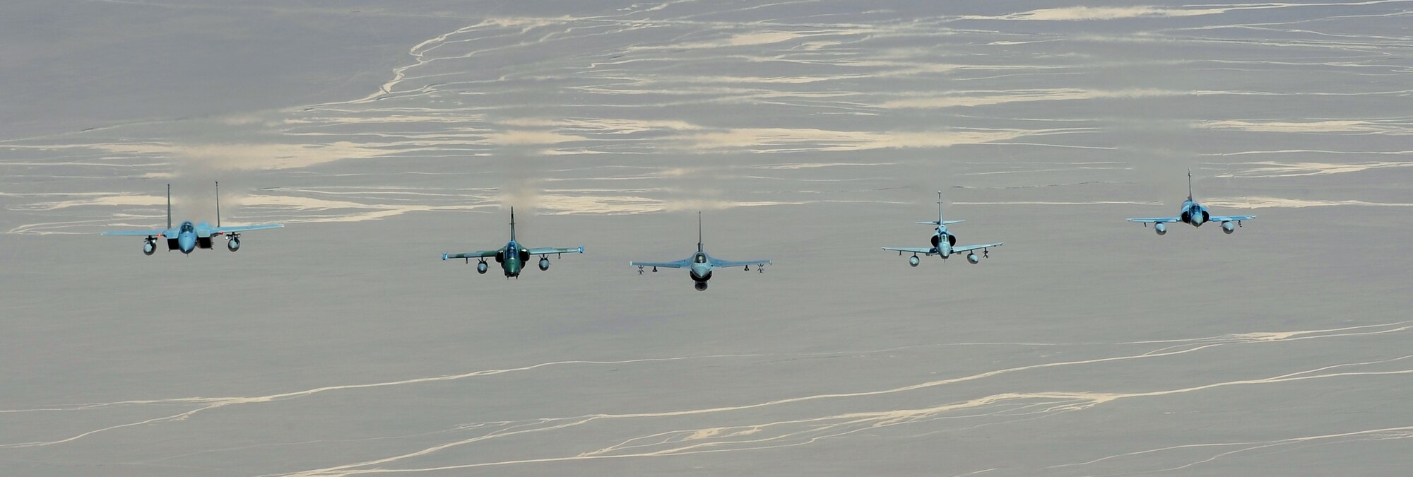 ANTOFAGASTA, Chile -- The United State’s F-15, Brazil’s A-1, Chile’s F-16, Argentina’s A-4 and France’s Mirage flying in formation during Exercise SALITRE II hosted by Chile. (U.S. Air Force Photo by Master Sergeant Daniel Farrell)