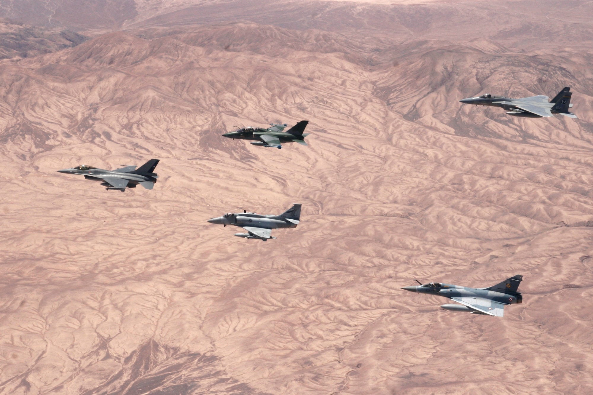 ANTOFAGASTA, Chile -- Chile, Argentina, Brazil, France and the United States participate in a dissimilar aircraft formation during Exercise SALITRE II hosted by Chile. (U.S. Air Force Photo by Technical Sergeant Travis Burke)