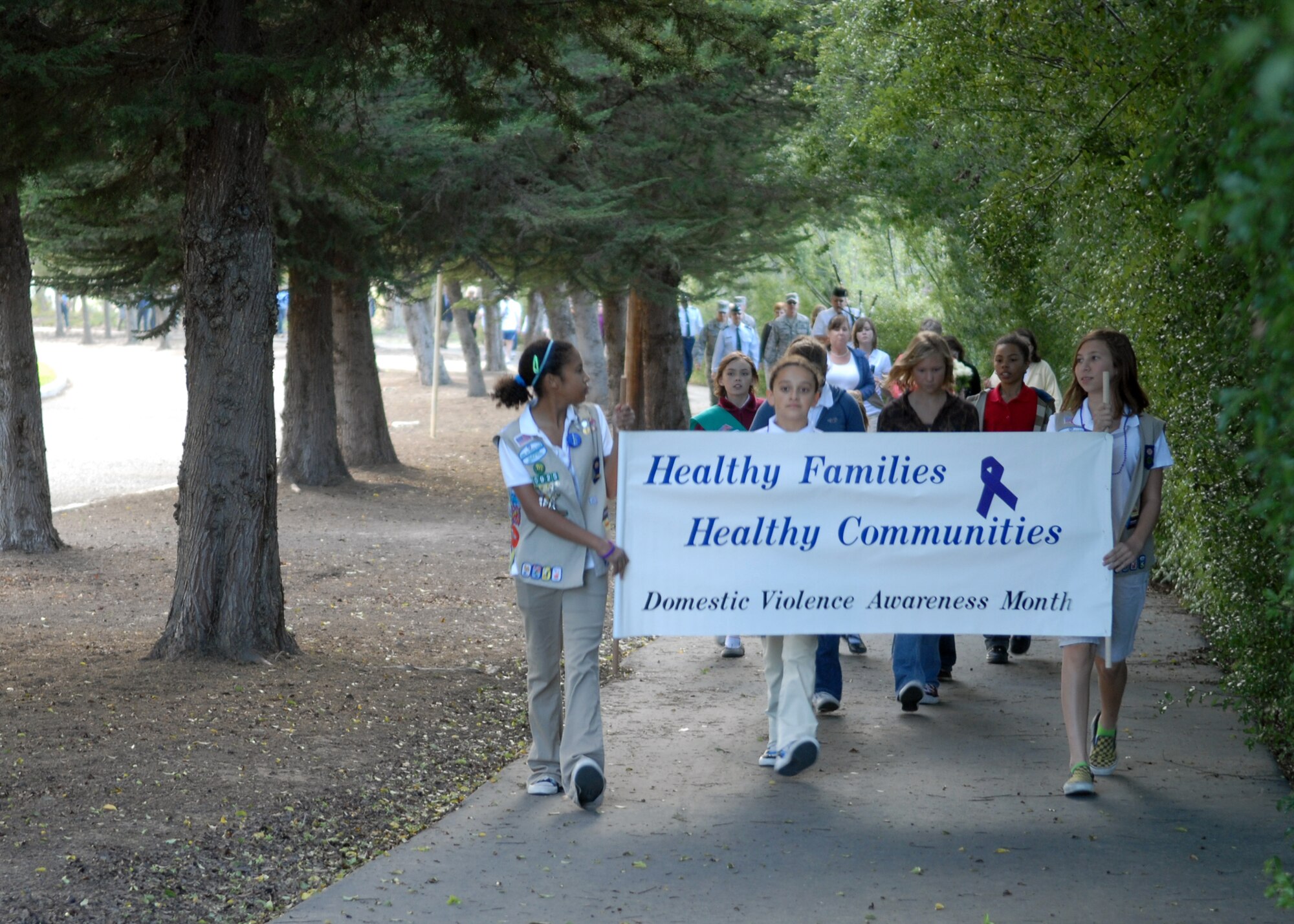 VANDENBERG AIR FORCE BASE, Calif. - Led by Girl Scout Troop 50925, the Vandenberg Community March Against Violence made its way from the corner of Utah and Korina Avenue here Tuesday, Oct. 20, 2009. The march was aimed to raise awareness of domestic violence on base as well as in the surrounding communities.(U.S. Air Force photo/ Airman 1st Class Angelina Drake)
