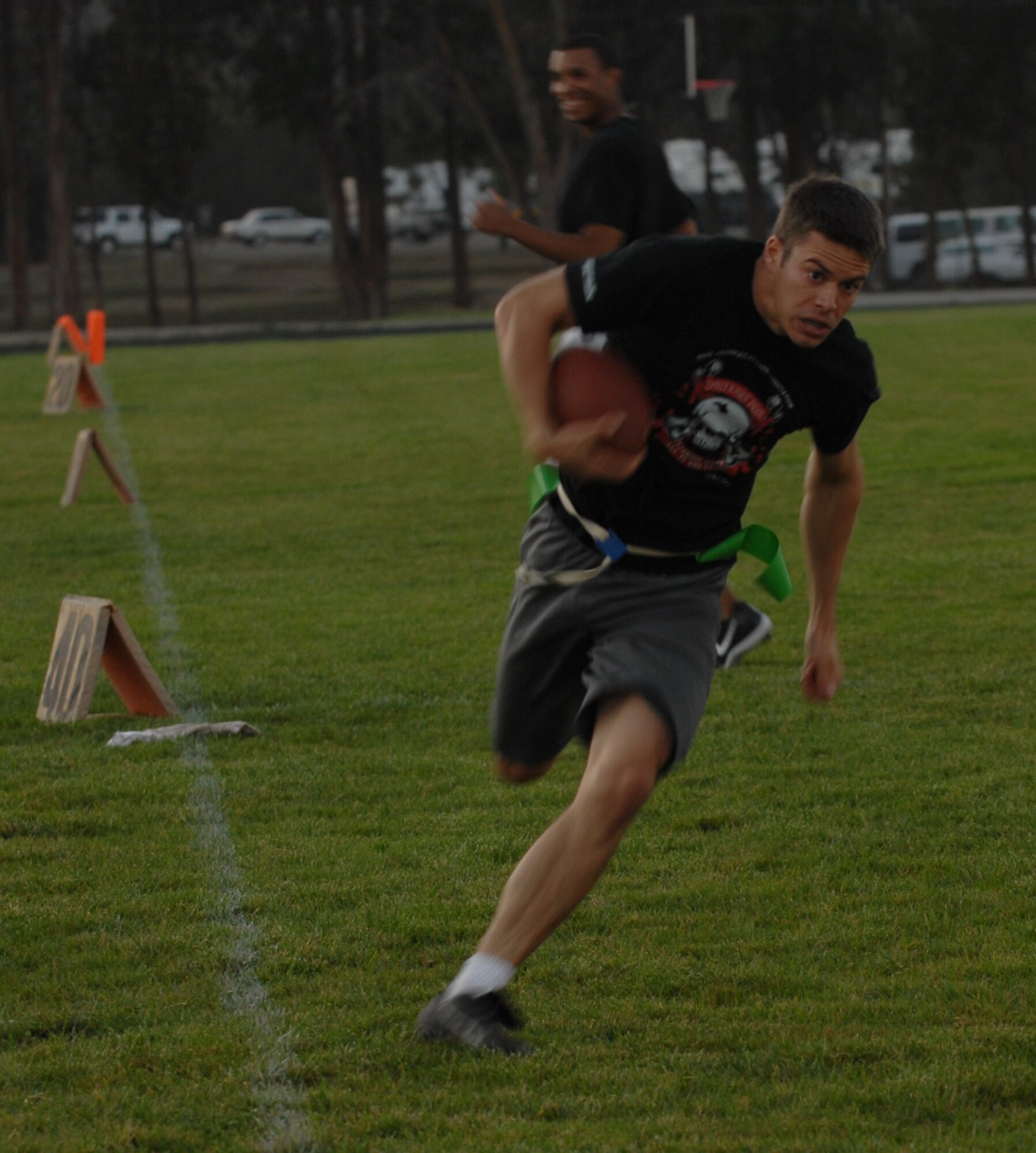 VANDENBERG AIR FORCE BASE, Calif. - Offensive lineman, 2nd Lt. Brian Crouse, sprints to the in-zone for a touchdown during an intramural flag football game Tuesday, Oct. 20, 2009 here.  The 14th Air Force came out on top 18-7, with a win  over the Launch Group.  For more information on intramural sports call the base fitness center at 805-606-3832. (U.S. Air Force photo/Senior Airman Antoinette Lyons)

