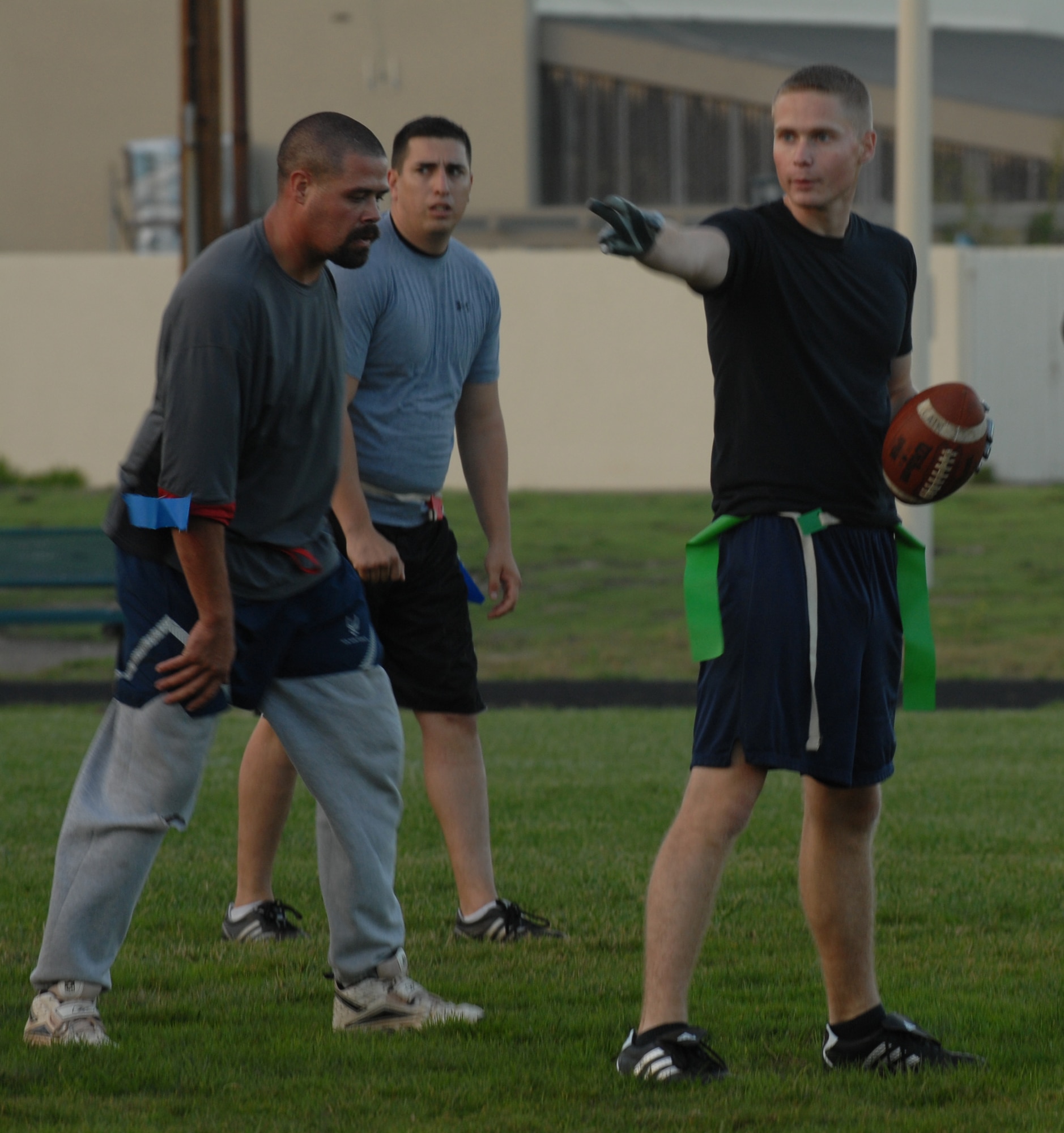 VANDENBERG AIR FORCE BASE, Calif. --   1st Lt. Shaun Lee, signals to his teammates the next play during intramural flag football on Tuesday, Oct. 20, 2009 here. The 14th Air Force came out on top 18-7, with a win over the Launch Group. For more information on intramural sports call the base fitness center at 805-606-3832. (U. S. Air Force photo/Senior Airman Antoinette Lyons)
