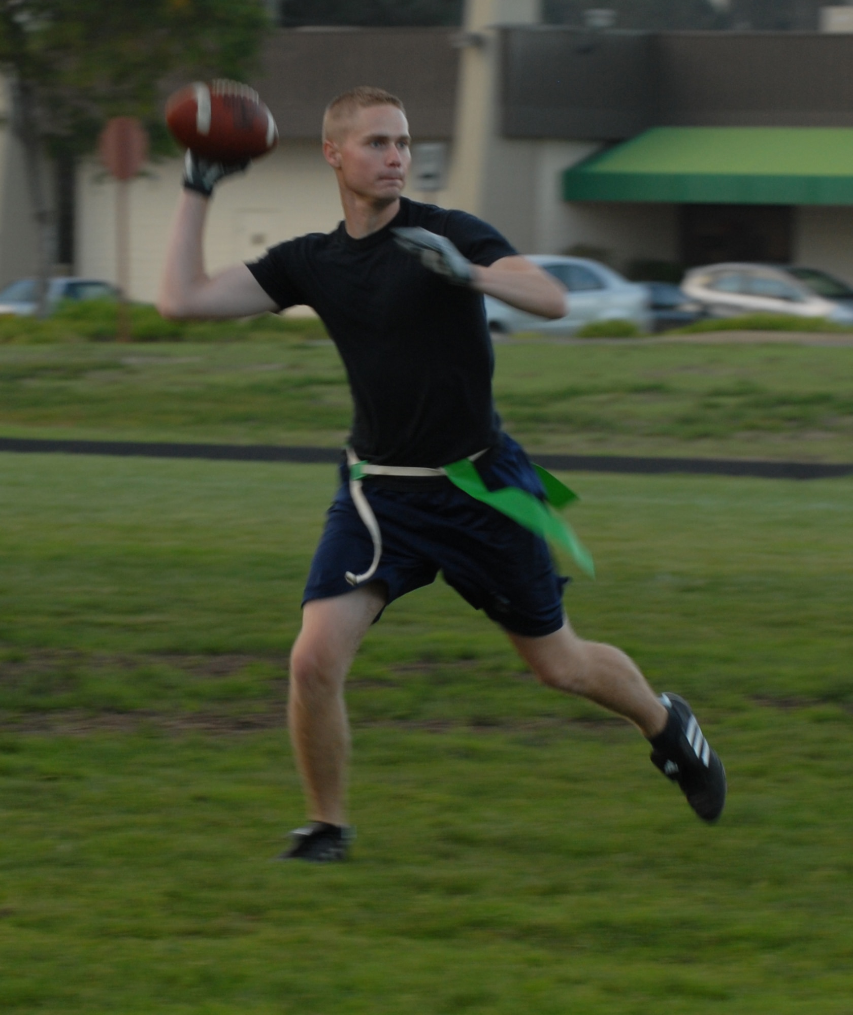 VANDENBERG AIR FORCE BASE, Calif. - 1st Lt. Shaun Lee, throws for a touchdown during the intramural flag football game here on Tuesday, Oct 20, 2009. The 14th Air Force came out on top 18-7, with a win over the Launch Group. For more information on intramural sports call the base fitness center at 805-606-3832. (U.S. Air Force photo/Senior Airman Antoinette Lyons)
