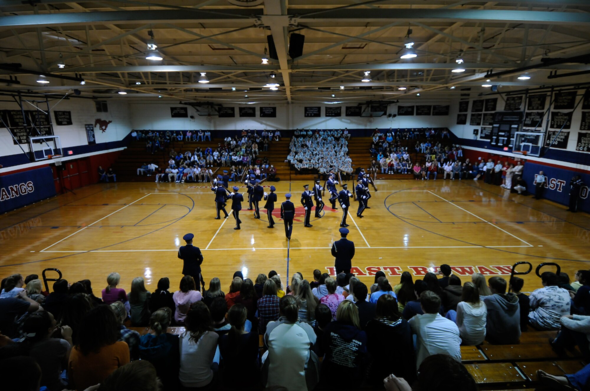 Airman 1st Class Rion Ehrman, United States Air Force Honor Guard Drill Team, speaks Oct. 14 with the current students of his alma mater, East Rowan High School, Rockwell, N.C., about joining the Air Force. The team spent nine days traveling through the Carolinas and Tennessee, performing at Drill Team members’ former high schools, in addition to their typical base and air show performances. Performing for these students helped the Drill Team inspire and communicate at a more familiar level. (U.S. Air Force photo by Senior Airman Alexandre Montes)