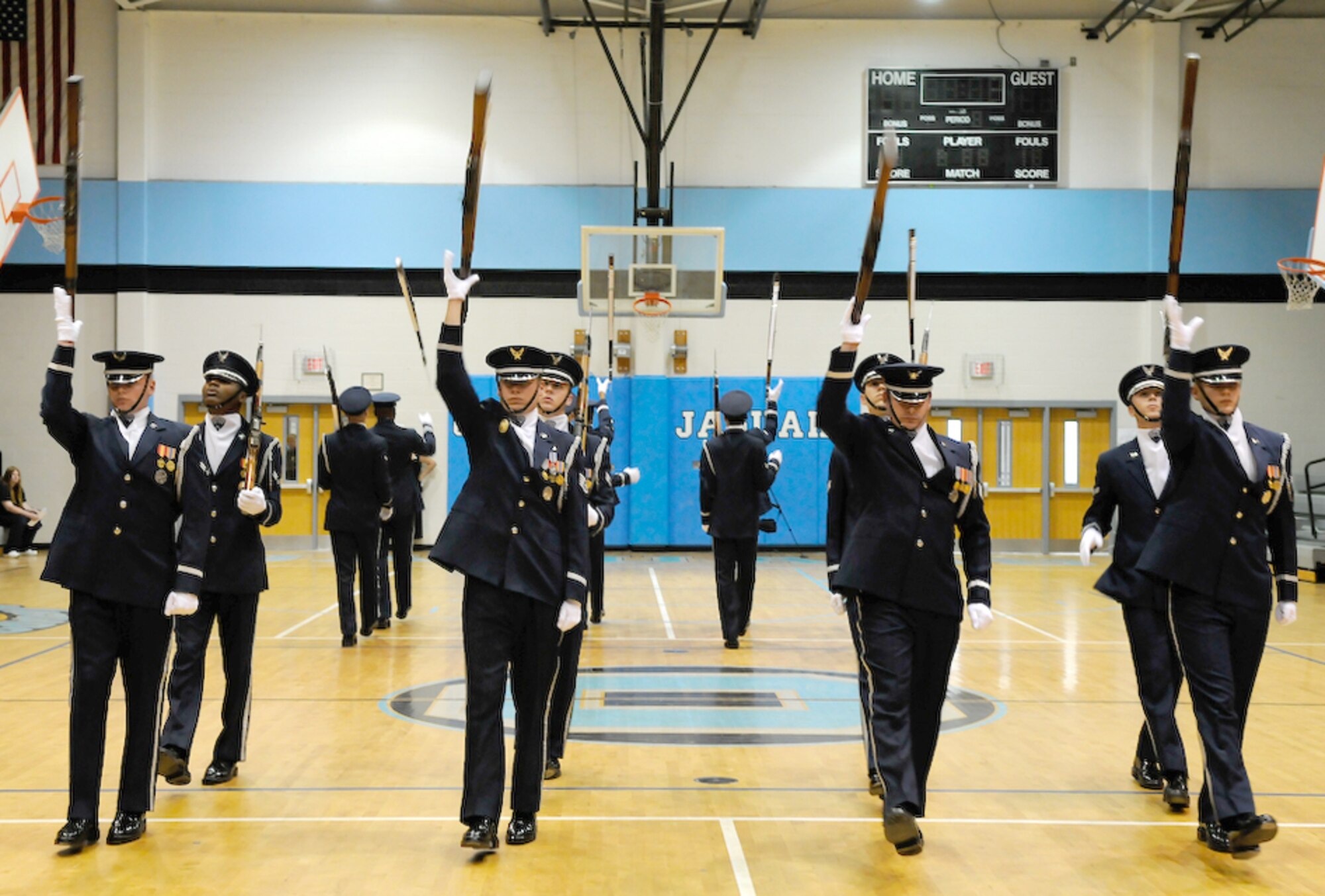 The United States Air Force Honor Guard Drill Team performs Oct. 15 at team member Airman 1st Class Doyle Boyd’s alma mater, Overhills High School, Spring Lake, N.C. The team spent nine days traveling through the Carolinas and Tennessee, performing at Drill Team members’ former high schools, in addition to their typical base and air show performances. Performing for these students helped the Drill Team inspire and communicate at a more familiar level. (U.S. Air Force photo by Senior Airman Alexandre Montes)