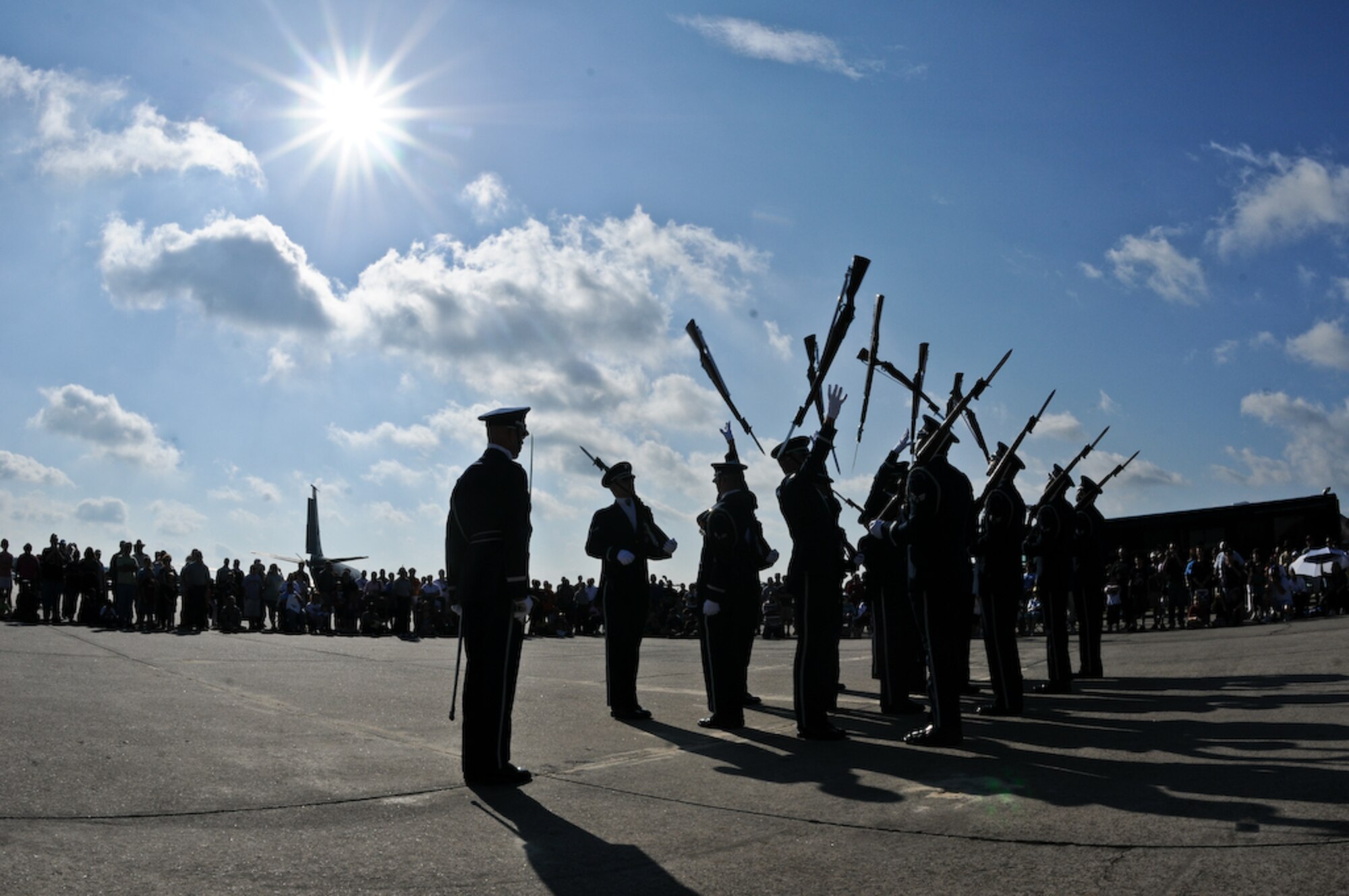 The United States Air Force Honor Guard Drill Team performs at the Joint Air National Guard Air Show at Pope Army Airfield, S.C on Oct. 11. The Drill Team supported the air show and performed for two days, drawing a large crowd. The team spent nine days traveling through the Carolinas and Tennessee, performing at Drill Team members’ former high schools, in addition to their typical base and air show performances. Performing for these students helped the Drill Team inspire and communicate at a more familiar level. (U.S. Air Force photo by Senior Airman Alexandre Montes)