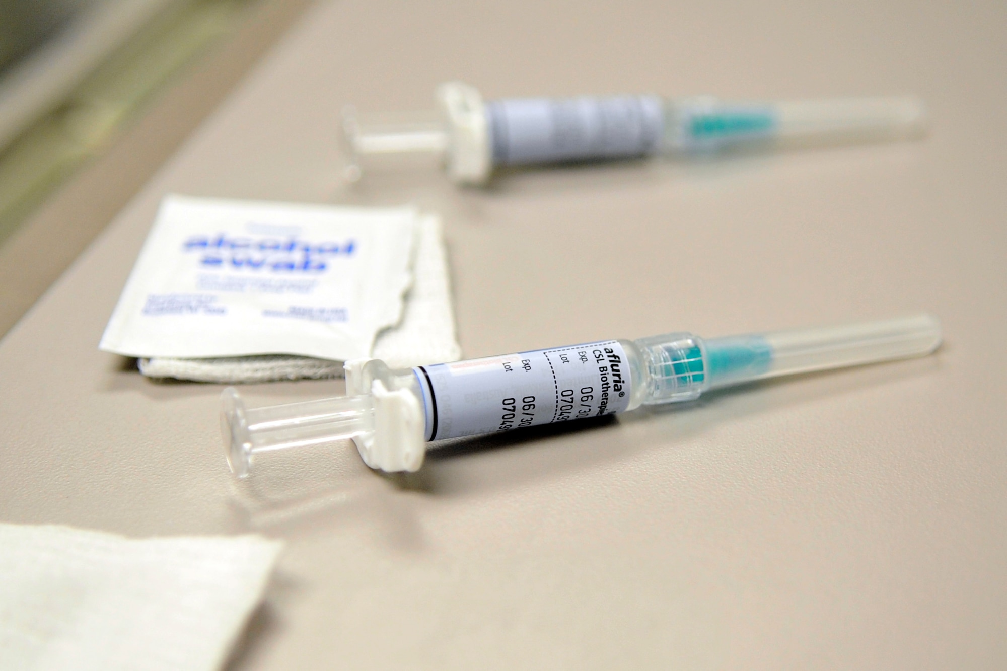 Seasonal flu vaccine syringes await patients at Malcolm Grow Medical Center, on Joint Base Andrews-NAF Washington, Md.