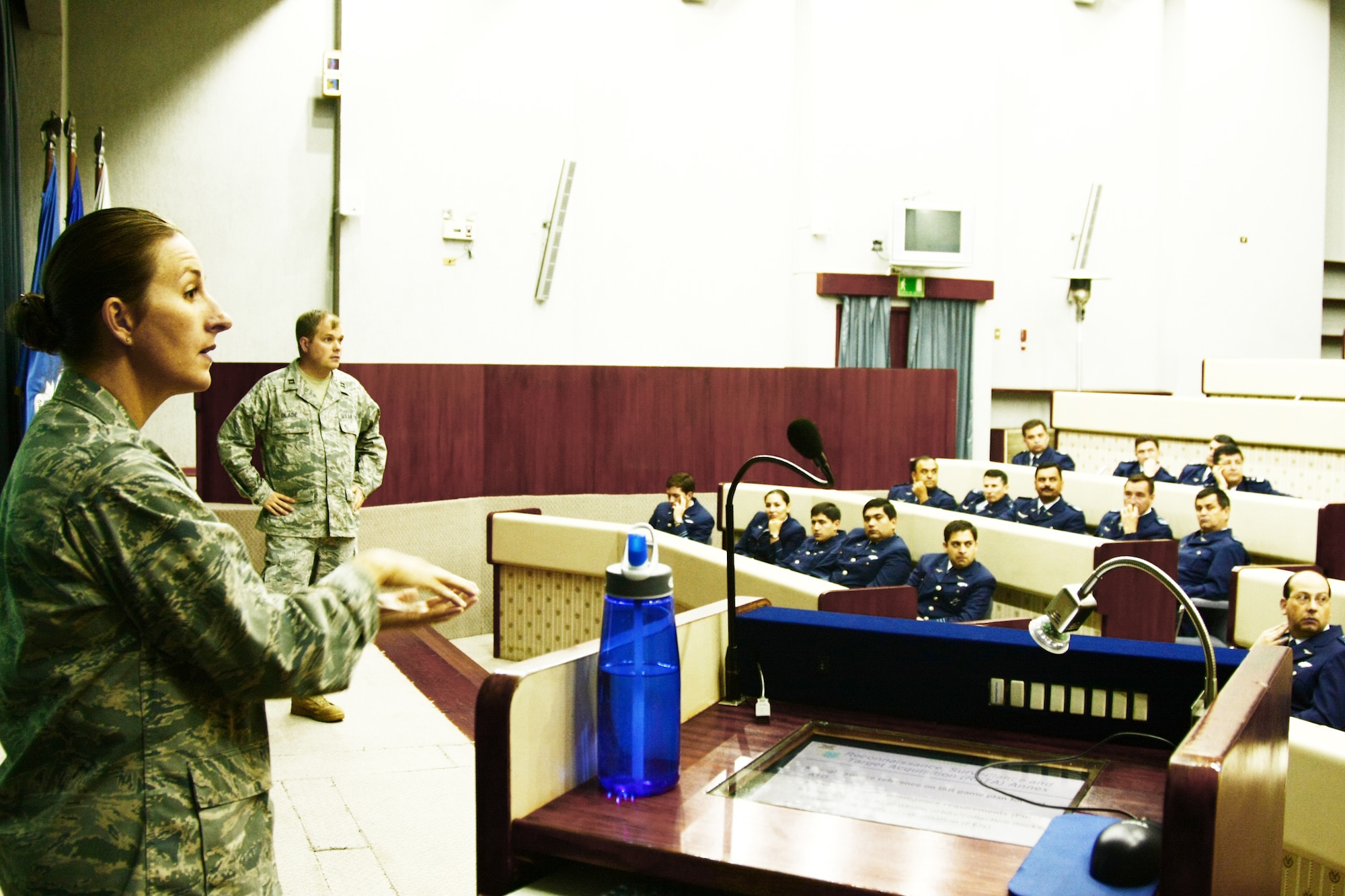 Maj. Jana Nyerges and Capt. Rick Glade brief students at the Chilean air war college during a Cooperation Team-One exchange Oct. 16, 2009, in Santiago, Chile. The team was in Chile to exchange ideas and best practices with members of the Chilean air force prior to participating in Exercise Salitre in October. Major Nyerges and Captain Glade are air operations center experts with 12th Air Force. (U.S. Air Force photo/Capt. Nathan Broshear) 