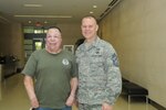 Chief Master Sgt. of the Air Force James Roy (Right), poses for a photograph with Wounded Warrior Tech. Sgt. Isreal Del Toro, during his tour of the Center for the Intrepid in San Antonio, TX Oct. 20. (U.S. Air Force photo by Rich McFadden)