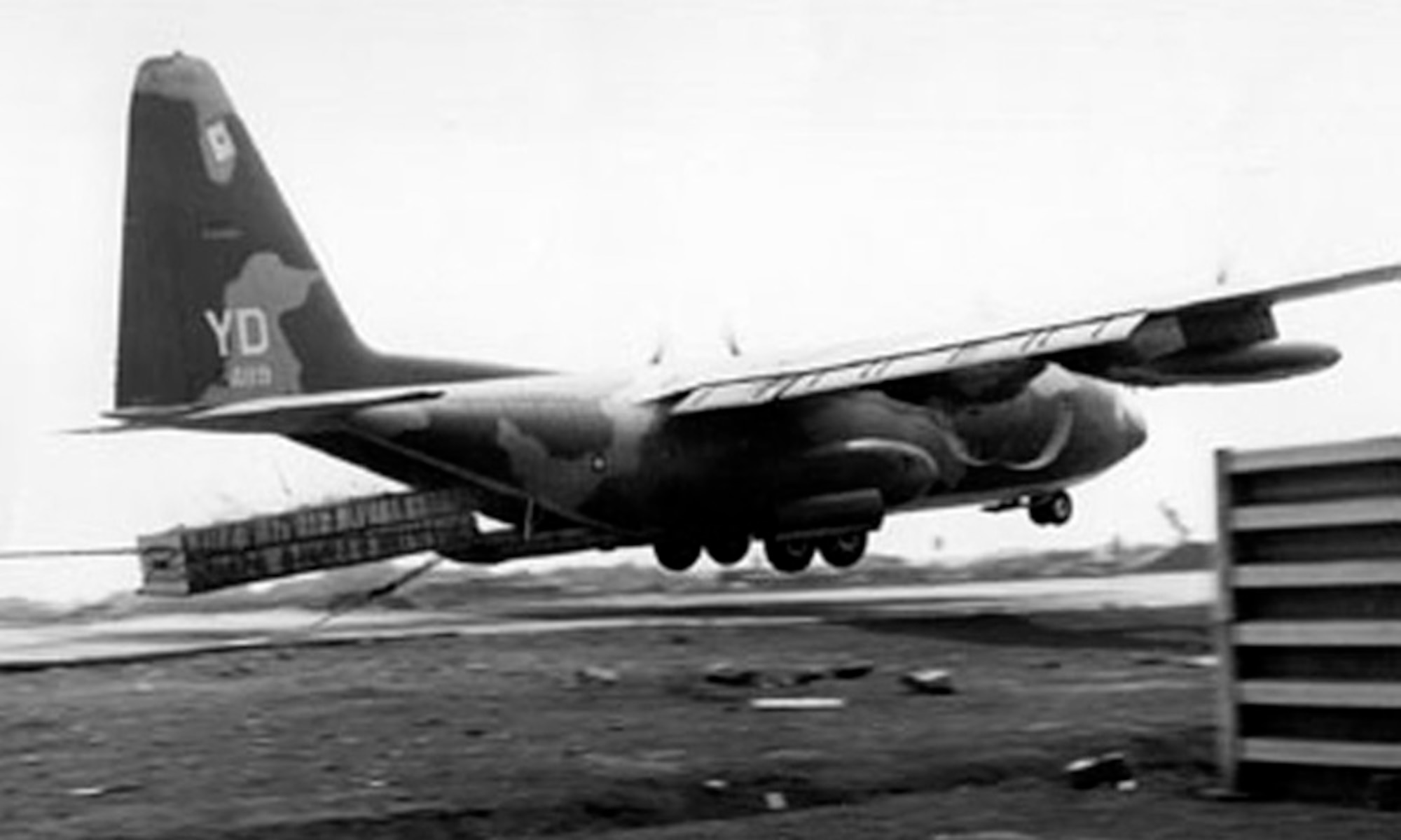 A C-130E takes flight.