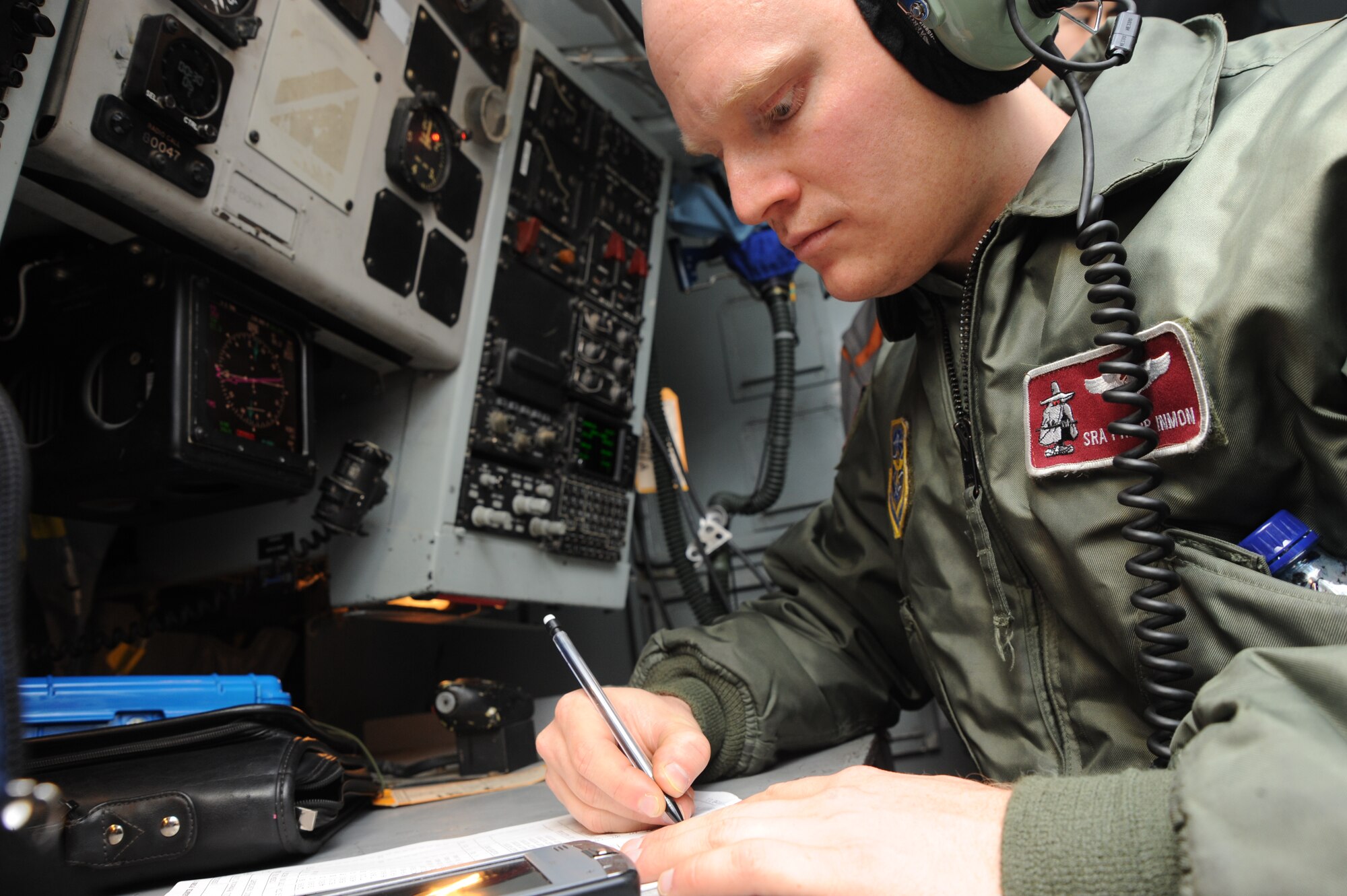 Senior Airman Philip Inmon, a 384th Air Refueling Squadron boom operator, records the weight and balance of a KC-135 Stratotanker during a preflight inspection for a Nuclear Operational Readiness Inspection exercise at McConnell Air Force Base, Kan., Oct. 16, 2009. Weight and balance is the measurement of fuel, cargo and personnel on board and is critical to flight safety. (U.S. Air Force photo/Tech. Sgt. Chyrece Campbell) 