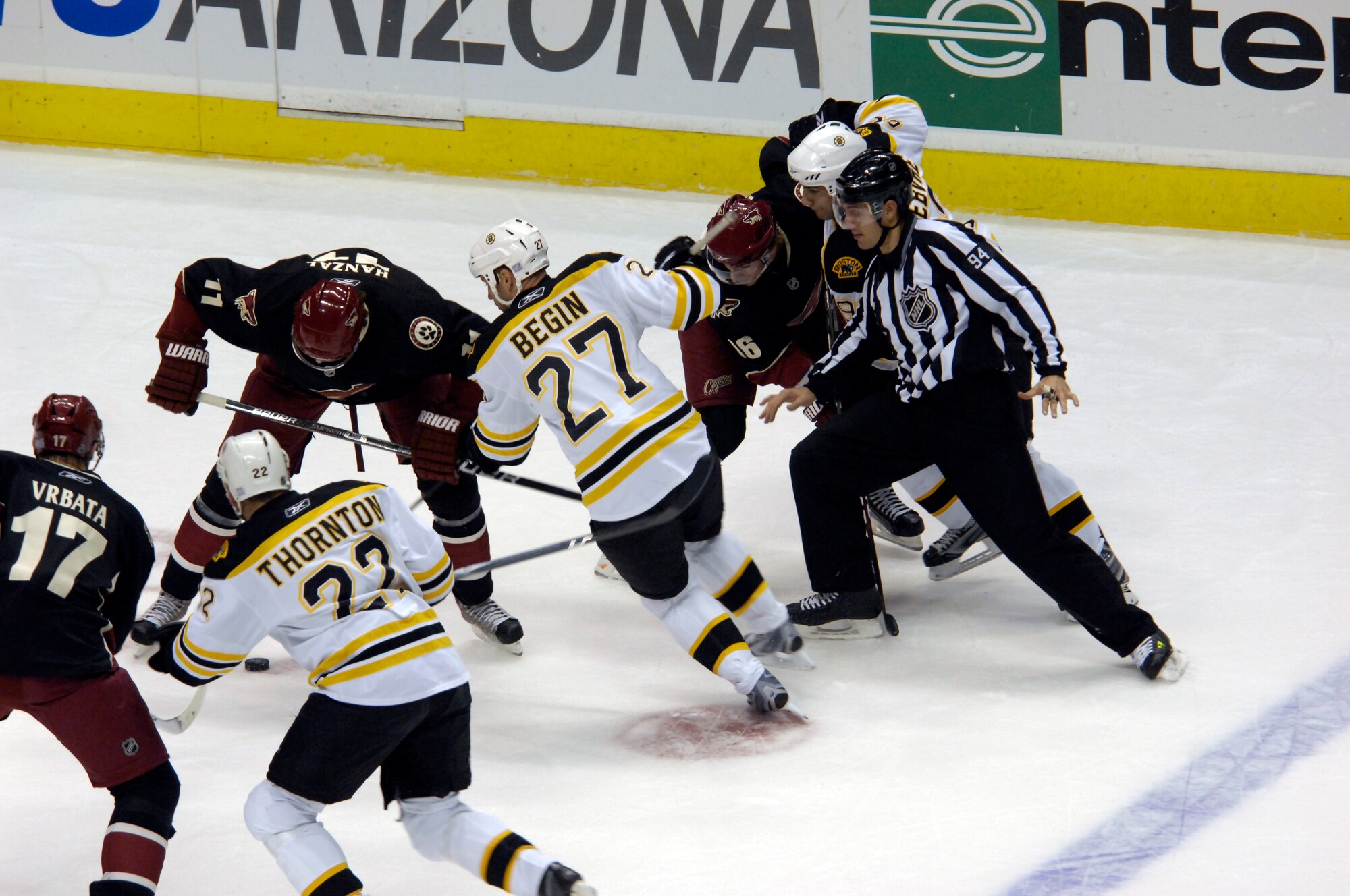 Players scramble for the puck during a hockey game at the Jobing.Com Areana in Glendale, Arizona, Oct. 17, 2009. (U.S. Air Force Photo by Staff Sgt Jason Colbert)