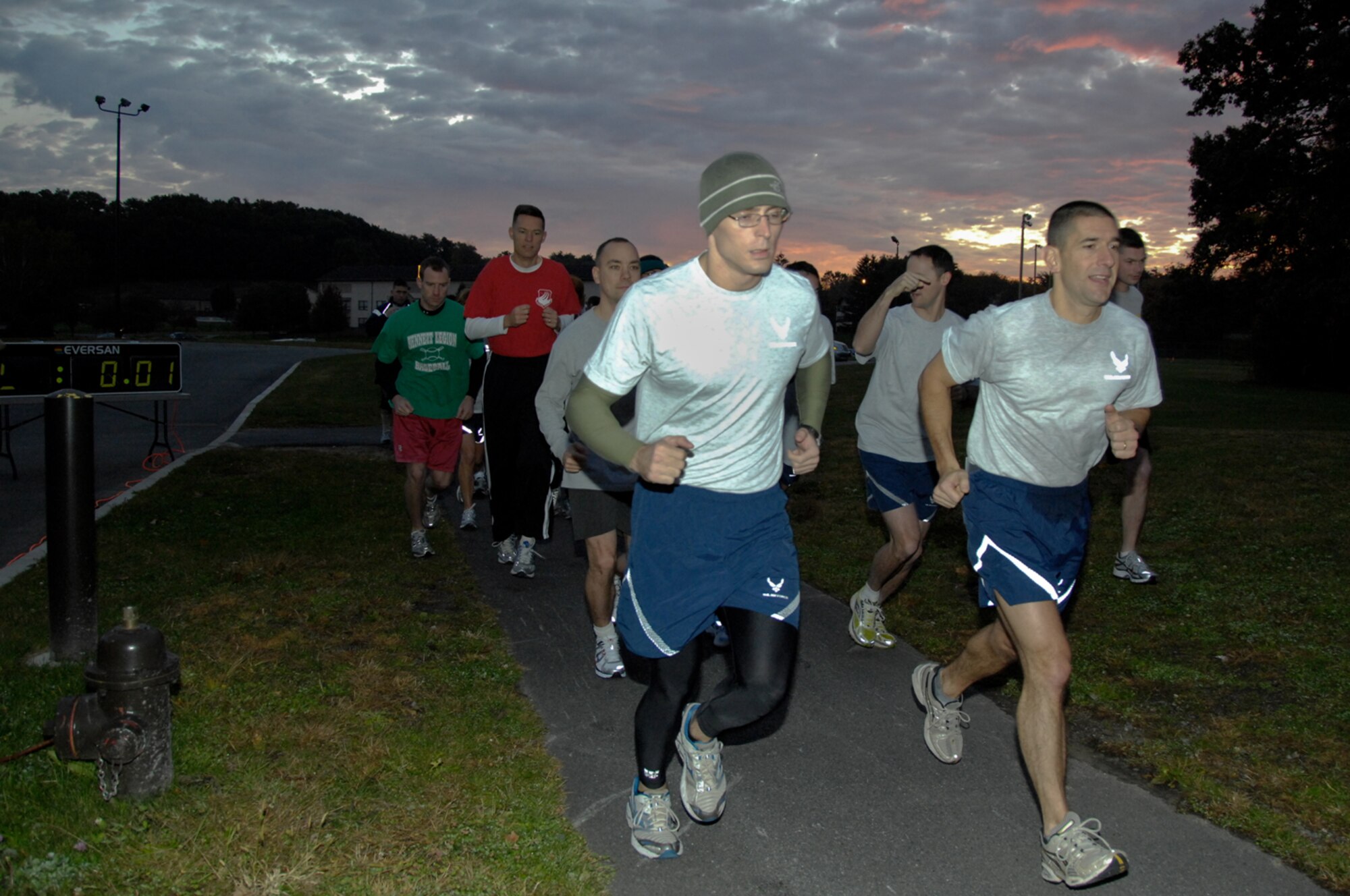 HANSCOM AIR FORCE BASE, Mass. – Hanscom runners greet the dawn of a new day and the start of the Autumn Classic 10K race on Oct. 21 at the Hanscom Sports and Fitness Center. For more information on upcoming fitness programs call 781-377-3639. (U.S. Air Force photo by Rick Berry)