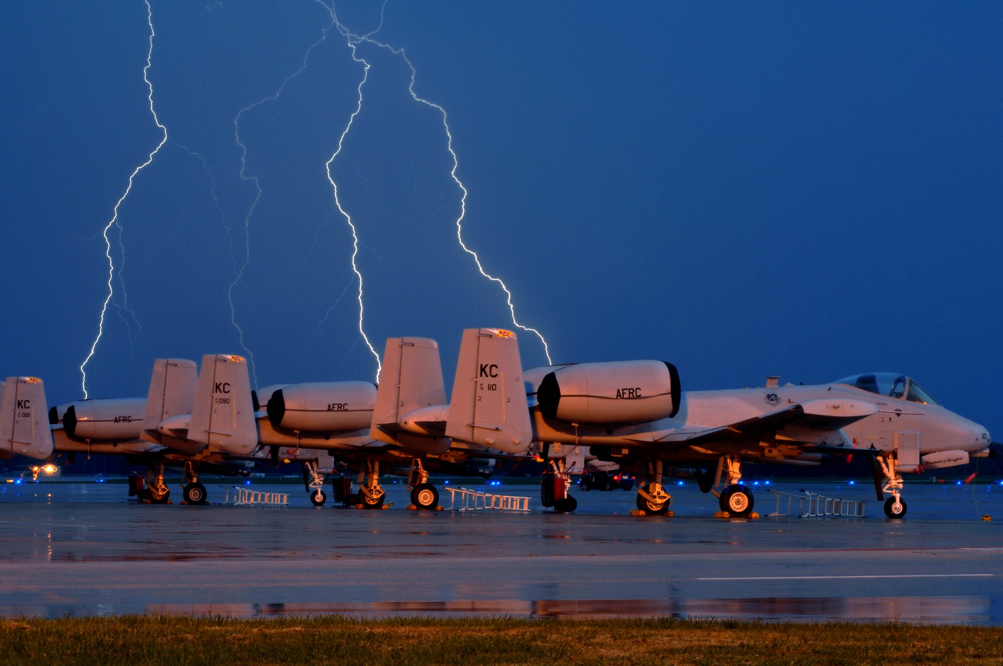 WHITEMAN AIR FORCE BASE, Mo.,  Lighting strikes over 442nd Fighter Wing A-10 Thunderbolt's II during an early morning thunderstorm, Oct. 20. The 442nd FW maintains a fleet of 27 A-10's. (U.S. Air Force photo/Senior Airman Kenny Holston)(Released) 