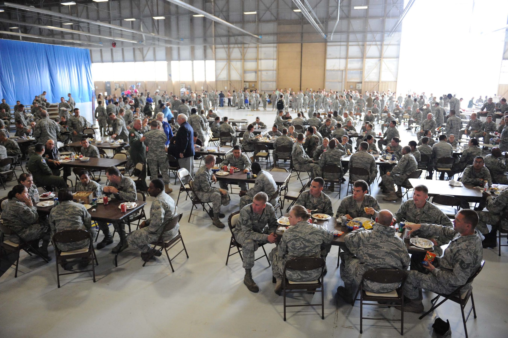 SHAW AIR FORCE BASE, S.C. -- Airmen from the 20th Fighter Wing take time to enjoy food from local vendors during a Military Appreciation Picnic Oct. 16. Military Appreciation Day was put together by the Greater Sumter Chamber of Commerce to show appreciation to all military members on Shaw Air Force Base. The event was a coordinated effort between the Sumter community, local businesses and the base. "This was a great way for the civilian community to show it's appreciation to the military community," said Master Sgt. Cedrick Powell, 20th Fighter Wing Judge Advocates Office. "I think all of the Airmen and Soldiers who came out were very pleased." (U.S. Air Force photo/Senior Airman Matt Davis)