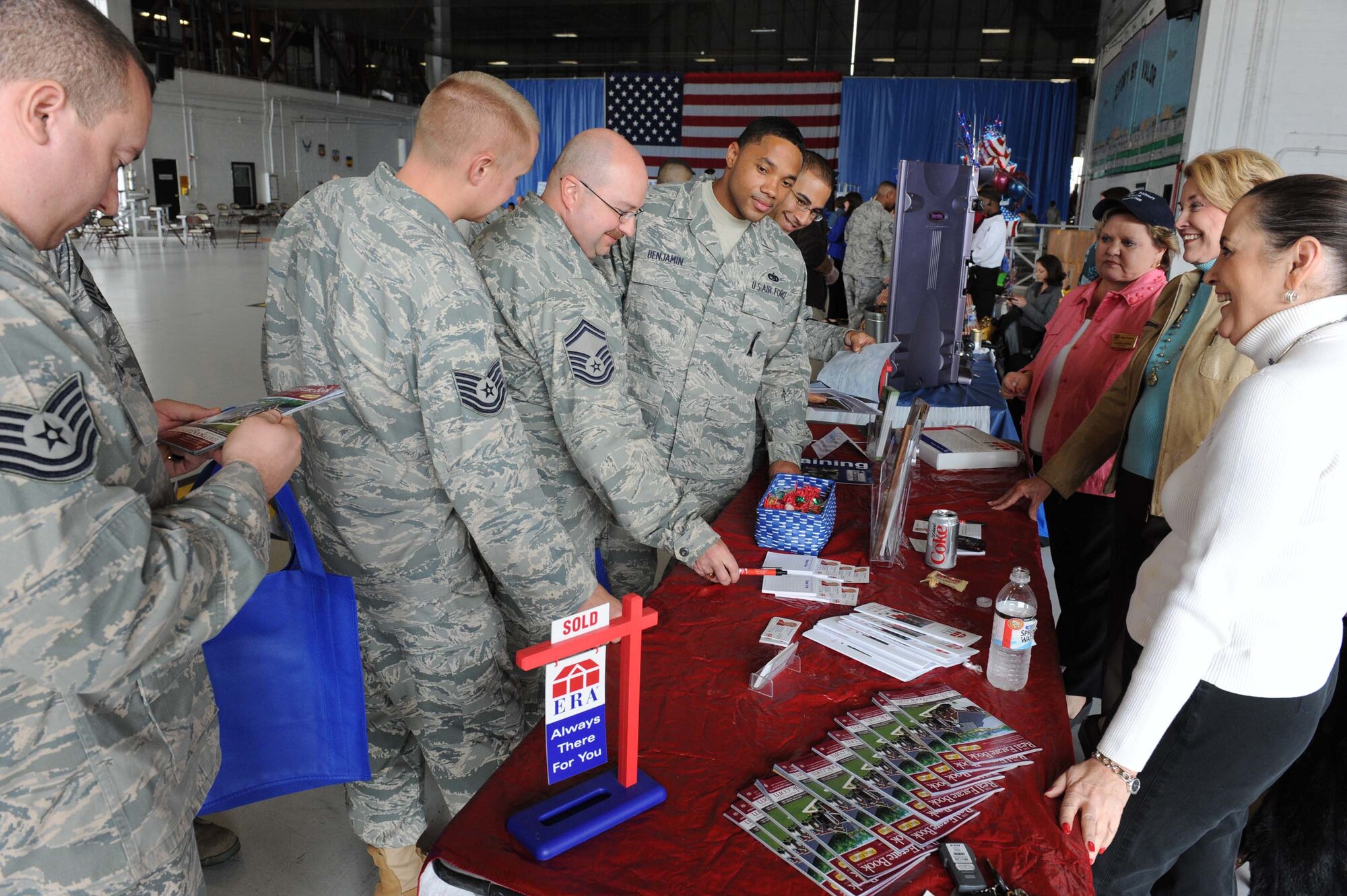 SHAW AIR FORCE BASE, S.C. -- Airmen from the 20th Fighter Wing visited the ERA Real Estate vendors table during a Military Appreciation Picnic Oct. 16. Military Appreciation Day was put together by the Greater Sumter Chamber of Commerce to show appreciation to all military members on Shaw Air Force Base.  It was a coordinated effort between the Sumter community, local businesses and the base. 

"This was a great way for the civilian community to show it's appreciation to the military community," said Master Sgt. Cedrick Powell, 20th Fighter Wing Judge Advocates Office. "I think all of the Airmen and Soldiers who came out were very pleased." (U.S. Air Force photo/Senior Airman Matt Davis)