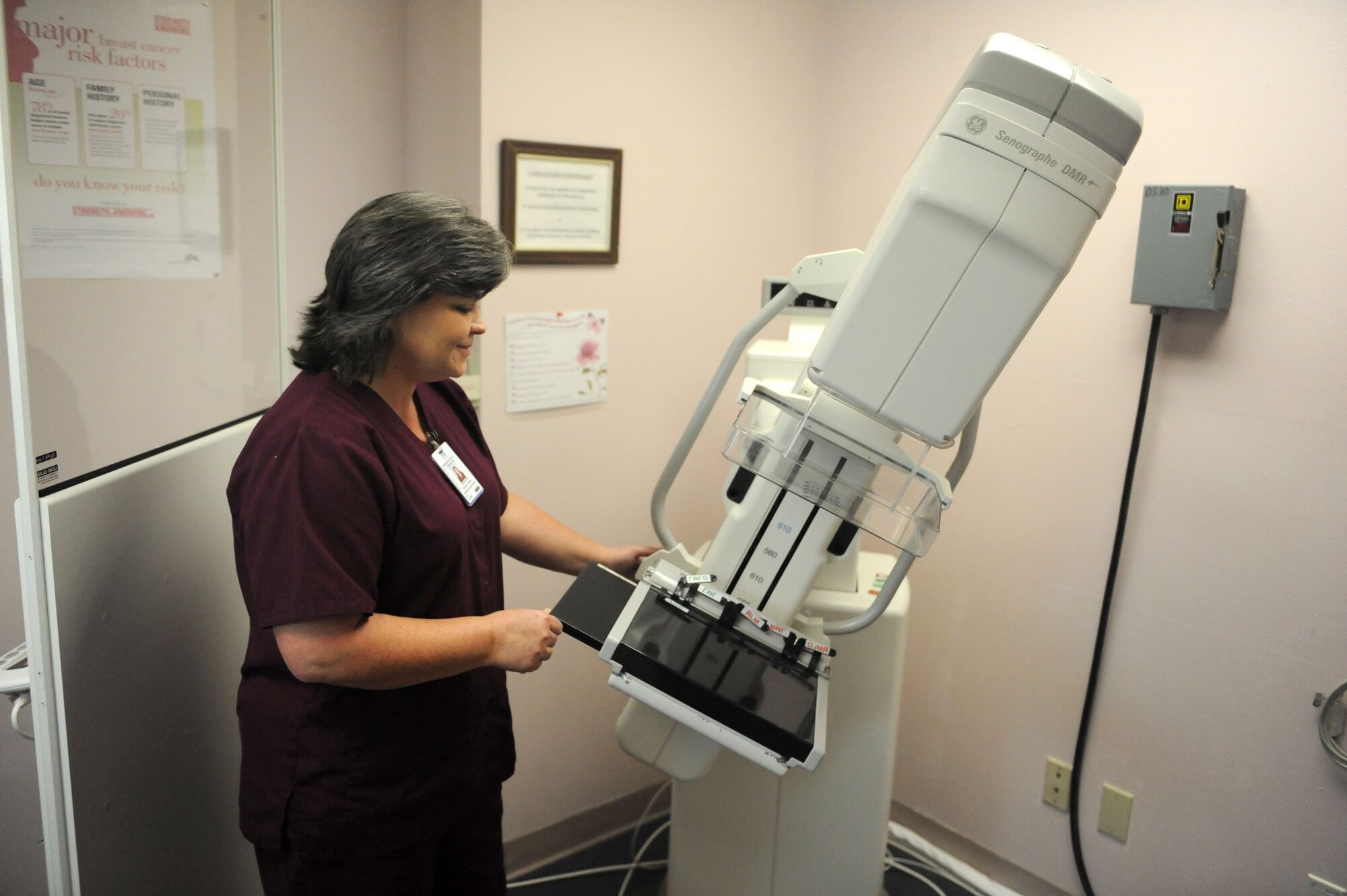Sharon Grubbs, 2d Medical Group mammography technologist, demonstrates the mammography machine. Tricare Prime beneficiaries over the age of 39 are entitled to a mammography screening once a year. Ms. Grubbs brings 23 years of experience to the staff. Call 456-6253 or stop by the Radiology Department on the first floor of the 2d Medical Group to make an appointment. (U.S. Air Force photo by Staff Sgt. Mike Andriacco) (RELEASED)