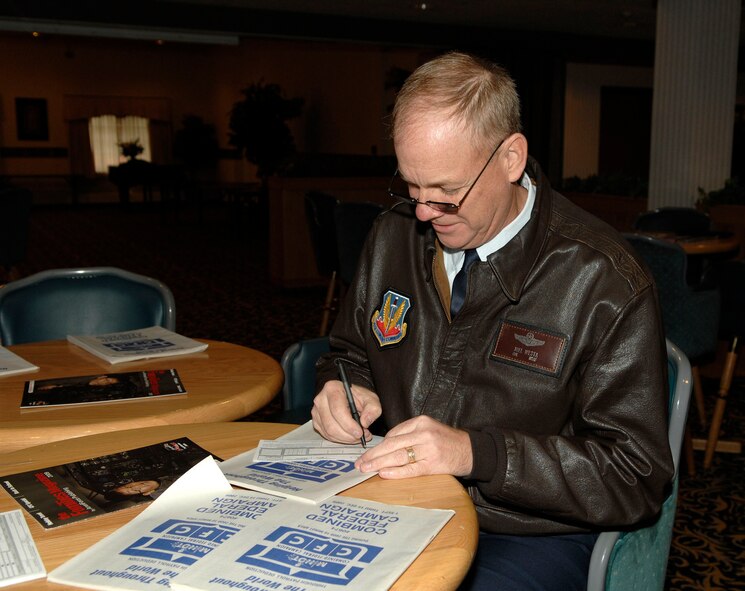 MINOT AIR FORCE BASE, N.D. -- Colonel Joel Westa, 5th Bomb Wing commander, fills out his pledge card for the Combined Federal Campaign here Oct. 19.  Established in 1961, the CFC is the largest workplace charity campaign in the country and the only campaign authorized to solicit and collect contributions from federal employees in the workplace. (U.S. Air Force Photo by Senior Airman Matthew Smith)