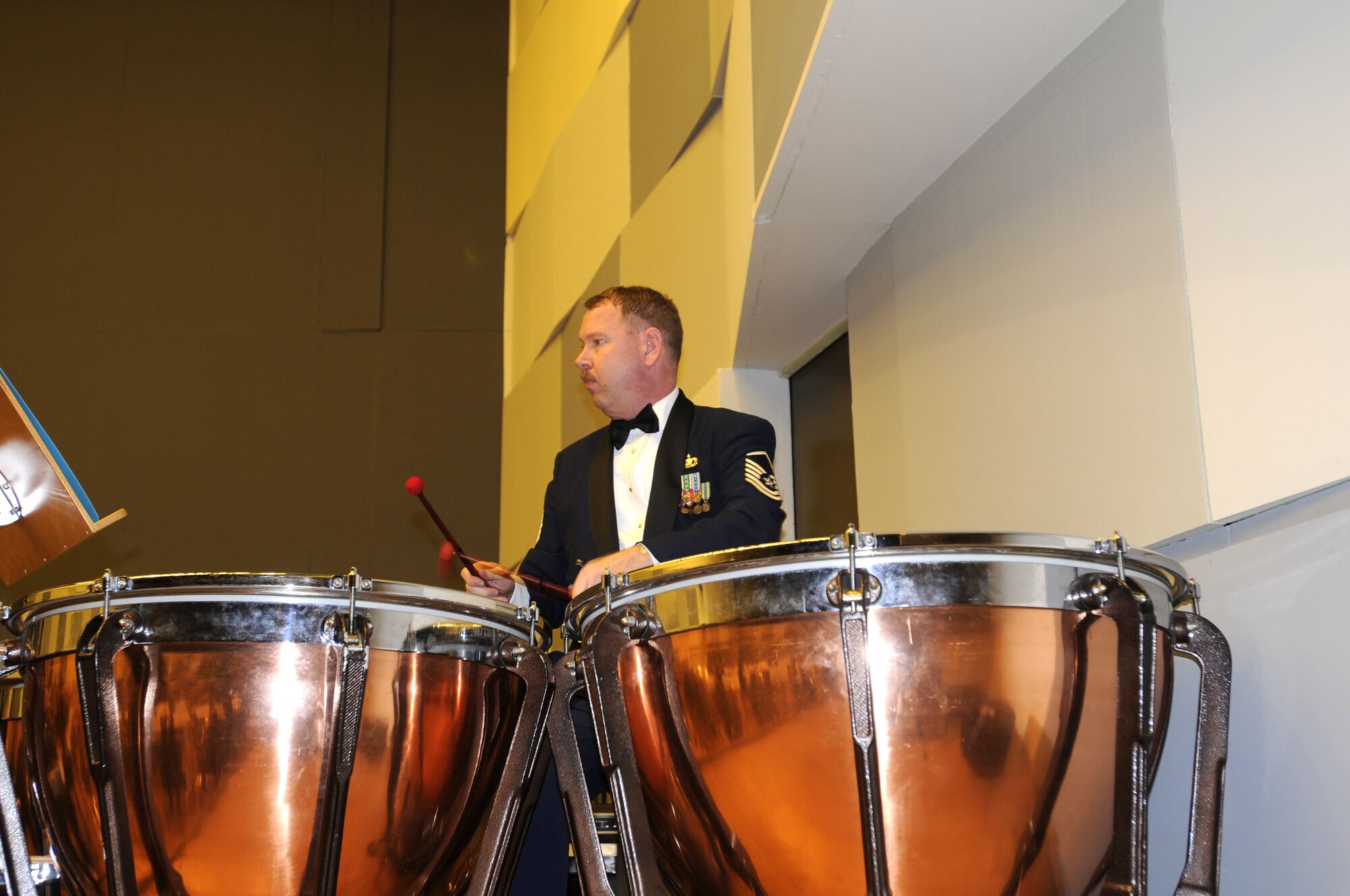 WROCLAW, Poland – Master Sgt. James Bartelt, plays the timpani drum during a U.S. Air Forces in Europe Band concert here at the Downbeat Filharmonia im. Witolda Lutoslawskiego Oct. 20.  The 41-piece U.S. Air Forces in Europe Band will perform six concerts in Poland in support of Gen. Roger Brady’s, USAFE commander, international relations program in partnership with the U.S. State Department.  (U.S. Air Force photo/Master Sgt. Kelley J. Stewart)