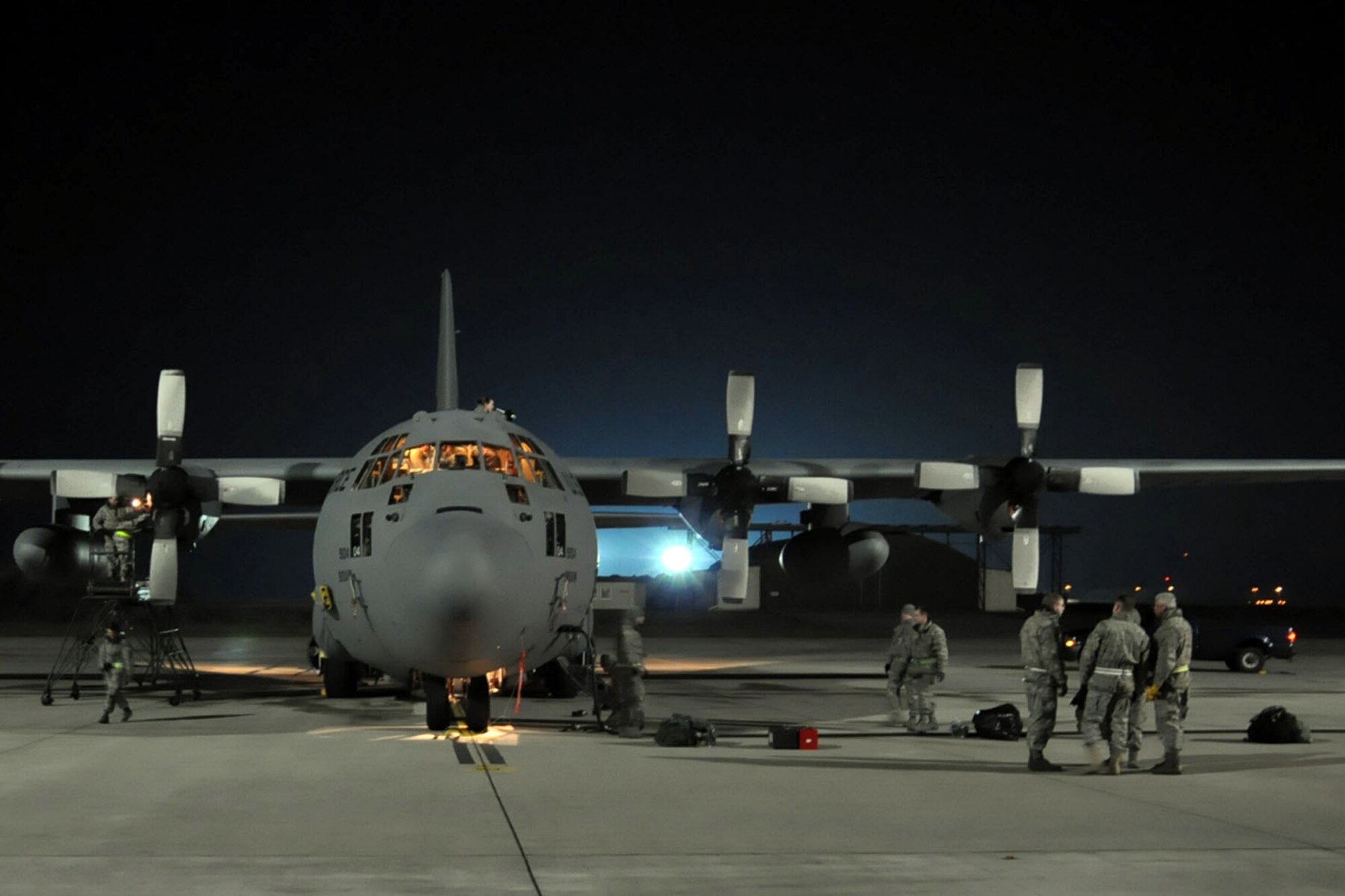 RAMSTEIN AIR BASE, Germany -- Crew chiefs and aircraft mechanics assigned to the 910th Maintenance Squadron, based at Youngstown Air Reserve Station, Ohio, perform a basic post-flight inspection on a C-130H Hercules tactical cargo transport aircraft assigned to the 910th Airlift Wing, also based at YARS, on the flightline here, October 20, 2009. The aircraft returned to Ramstein Air Base after completing an airlift mission from Tel Aviv, Israel, hauling a cargo compartment full of supplies and equipment. The maintenance personnel are checking the C-130 for any structural defects and mechanical or electrical failures or anything else not within operating standards for the aircraft. The YARS maintenance personnel, the C-130 and its crew are attached to the 38th Expeditionary Airlift Wing, base here, in support of Operation Joint Enterprise. More than 70 Airmen consisting of flight crews, maintenance personnel and support staff are currently attached to the 38th EAS with the airlift mission that will support locations in the U.S. Europe Command (EUROCOM), the U.S. Africa Command (AFRICOM) and the U.S. Central Command (CENTCOM) theaters of operations. U.S. Air Force photo by Master Sgt. Bob Barko Jr.      