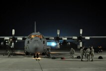 RAMSTEIN AIR BASE, Germany -- Crew chiefs and aircraft mechanics assigned to the 910th Maintenance Squadron, based at Youngstown Air Reserve Station, Ohio, perform a basic post-flight inspection on a C-130H Hercules tactical cargo transport aircraft assigned to the 910th Airlift Wing, also based at YARS, on the flightline here, October 20, 2009. The aircraft returned to Ramstein Air Base after completing an airlift mission from Tel Aviv, Israel, hauling a cargo compartment full of supplies and equipment. The maintenance personnel are checking the C-130 for any structural defects and mechanical or electrical failures or anything else not within operating standards for the aircraft. The YARS maintenance personnel, the C-130 and its crew are attached to the 38th Expeditionary Airlift Wing, base here, in support of Operation Joint Enterprise. More than 70 Airmen consisting of flight crews, maintenance personnel and support staff are currently attached to the 38th EAS with the airlift mission that will support locations in the U.S. Europe Command (EUROCOM), the U.S. Africa Command (AFRICOM) and the U.S. Central Command (CENTCOM) theaters of operations. U.S. Air Force photo by Master Sgt. Bob Barko Jr.      