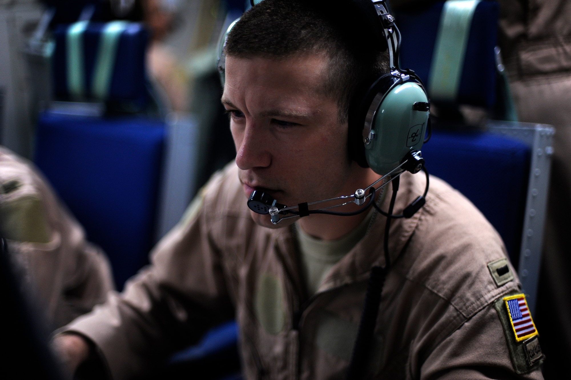 U.S. Air Force 1st Lt. Mike Powers, a weapons system officer from the 960th Expeditionary Airborne Air Control Squadron, monitors air assets during an E-3 Sentry Airborne Warning and Control System mission over Afghanistan, Oct. 8, 2009.  (U.S. Air Force photo by Staff Sgt. Michael B. Keller) (Released)
