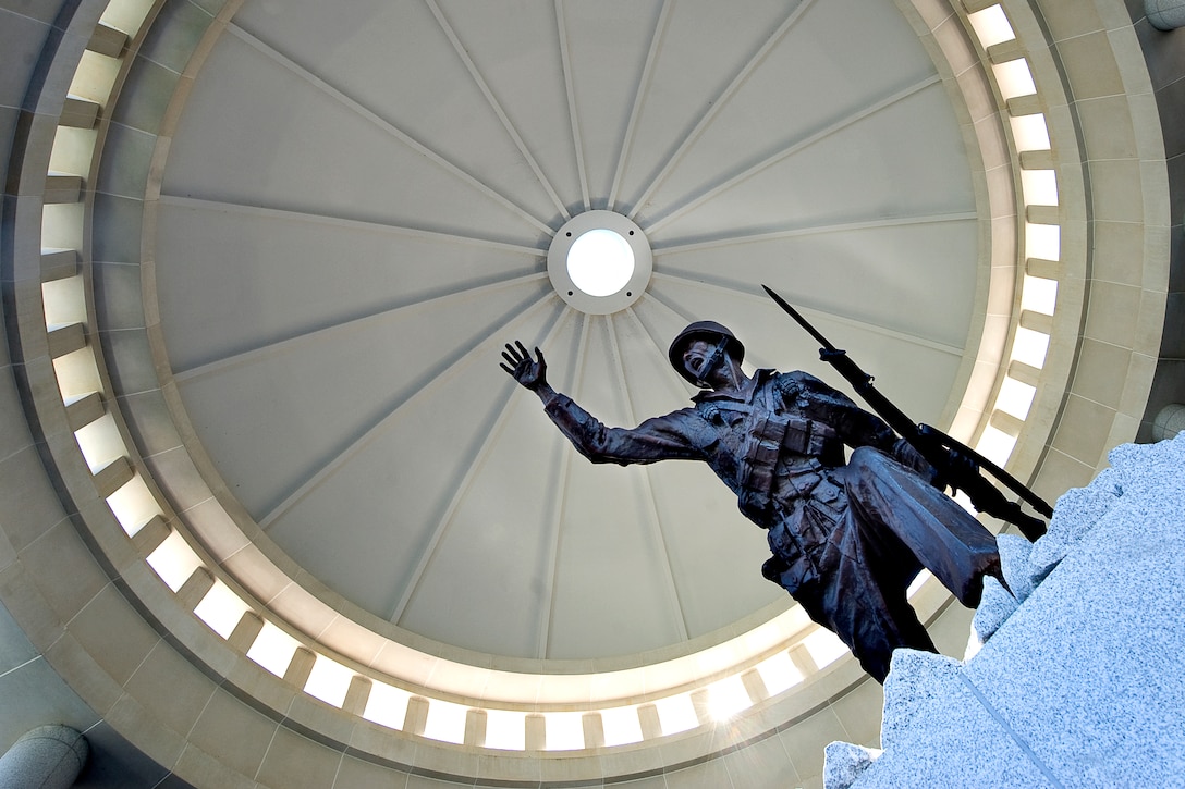 The "Follow Me" statue stands at the entrance of the National Infantry Museum on Fort 
Benning, Ga., Oct. 20, 2009. The statue was created in 1959 by two soldiers, Pvt. 1st Class Manfred Bass, sculptor and designer, and Pvt. 1st Class Karl H. Van Krog, his assistant.