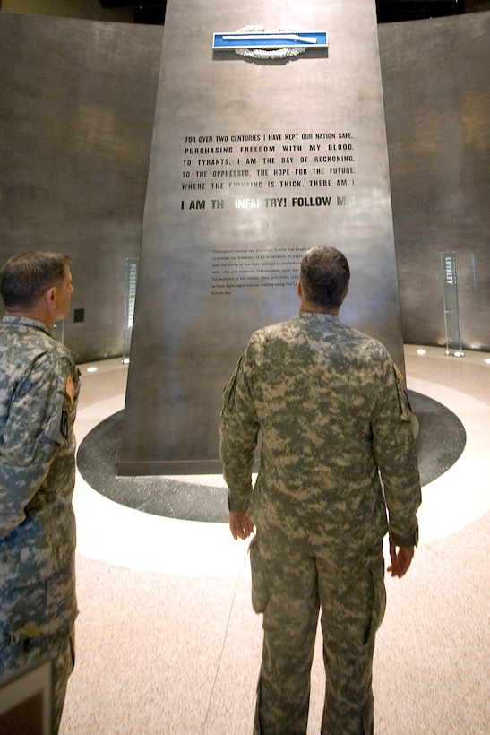 Army Chief of Staff Gen. George W. Casey Jr. reviews an exhibit at the National Infantry Museum on Fort Benning, Ga., Oct. 20, 2009. The exhibit reads "For two centuries I have kept our nation safe, purchasing freedom with my blood. To tyrants, I am the day of reckoning; to the oppressed, the hope for the future. Where the fighting is thick, there am I. I am the Infantry! Follow me!"