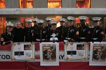 Marines from 6th Communication Battalion, 4th Marine Logistics Group, and Stewart Jacobson, author and producer, wait to talk with Al Roker on NBC's "Today Show," Oct. 21, New York City about the U.S. Marine Corps Reserve Toys for Tots Program. The program is a charitable extension of the Marine Corps that collects toys for as many of the 13 million children living in poverty as possible at Christmas-time each year. These Brooklyn, N.Y., based Marines handle all donations and distributions for New York City and surrounding area. For more information about Toys for Tots visit www.toysfortots.org.   (Official Marine Corps photo by Sgt. Randall A. Clinton)
