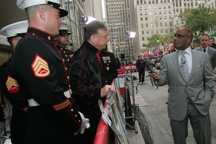 Marines from 6th Communication Battalion, 4th Marine Logistics Group, and Stewart Jacobson, author and producer, talk with Al Roker on NBC's "Today Show," Oct. 21, New York City about the U.S. Marine Corps Reserve Toys for Tots Program. The program is a charitable extension of the Marine Corps that collects toys for as many of the 13 million children living in poverty as possible at Christmas-time each year. Over the past 62 years the U.S. Marine Corps Reserve Toys for Tots Program has distributed 400 million toys to 188 million less fortunate children. These Brooklyn, N.Y., based Marines handle all donations and distributions for New York City. For more information about Toys for Tots visit www.toysfortots.org.   (Official Marine Corps photo by Sgt. Randall A. Clinton)