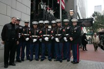 Marines from 6th Communication Battalion, 4th Marine Logistics Group, and Stuart Jacobson, author and producer, stand in front of the 21 Club in New York, before a luncheon about the U.S. Marine Corps Reserve Toys for Tots Program. The program is a charitable extension of the Marine Corps that collects toys for as many of the 13 million children living in poverty as possible at Christmas-time each year. These Brooklyn, N.Y., based Marines handle all donations and distributions for New York City and surrounding area. For more information about Toys for Tots visit www.toysfortots.org.