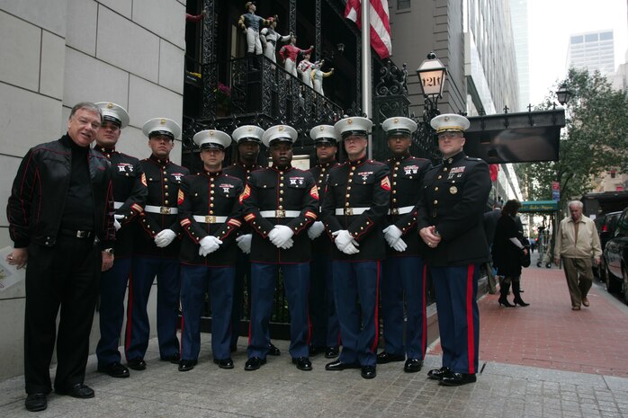 Marines from 6th Communication Battalion, 4th Marine Logistics Group, and Stuart Jacobson, author and producer, stand in front of the 21 Club in New York, before a luncheon about the U.S. Marine Corps Reserve Toys for Tots Program. The program is a charitable extension of the Marine Corps that collects toys for as many of the 13 million children living in poverty as possible at Christmas-time each year. These Brooklyn, N.Y., based Marines handle all donations and distributions for New York City and surrounding area. For more information about Toys for Tots visit www.toysfortots.org.