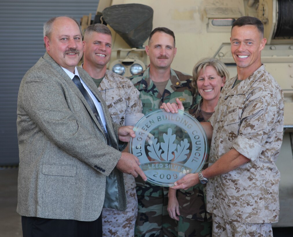 Kevin McBride, vice president for N.C. VIRTEXCO Corp., Col. William P. Davis, Assistant Chief of Staff for Facilities, Marine Forces Reserve, Cmdr. Cheryl Hansen, Officer in Charge of Construction for Marine Corps Installations – East, and Col. Richard P. Flatau Jr., the commanding officer for Marine Corps Base Camp Lejeune, recently received the Leadership in Energy and Environmental Design Silver certification ceremony, for the building of SR-72, Reserve Training Center and Tank Maintenance Facility in the Greater Sandy Run area. Flatau said it was an honor for Lejeune to receive this award and lead the example with this achievement.