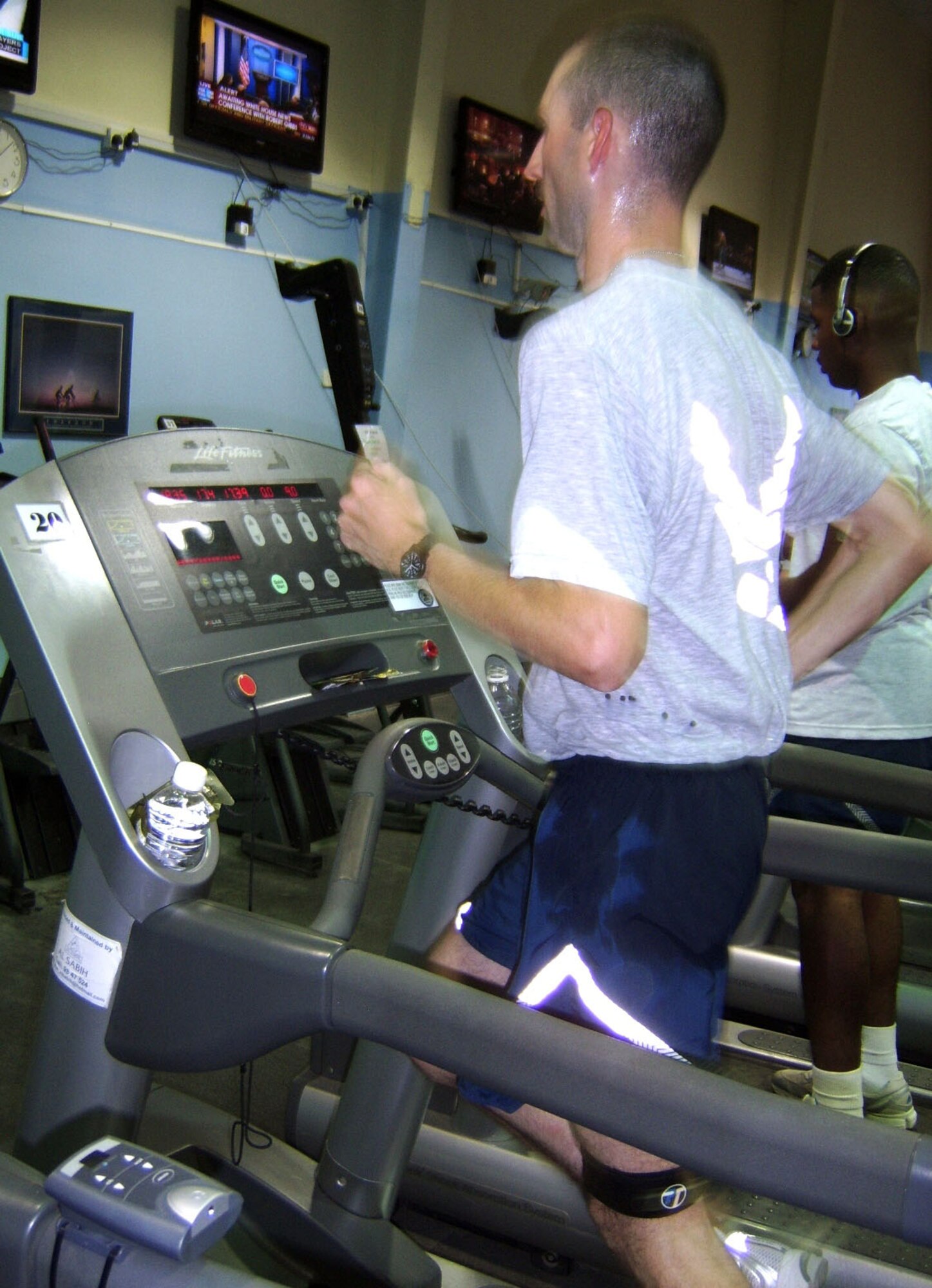 Staff Sgt. Jason Blair, a 387th Air Expeditionary Group emergency management craftsman at an air base in Southwest Asia, ran a personal best 2-hour, 56-minute marathon on a treadmill at the base fitness center Oct. 13, 2009. (Courtesy photo)