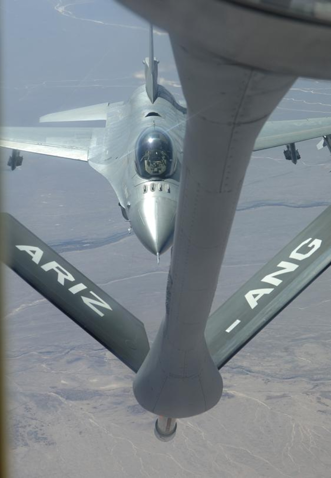 IQUIQUE, Chile – A Chilean F-16 approaches the boom of a U.S. KC-135 Stratotanker during a refueling mission Oct. 22. The Fuerza Aérea de Chile or FACh hosted the United States, Brazil, Argentina, and France during Exercise SALITRE II, a multinational exercise focused on interoperability. (U.S. Air Force photo by Tech. Sgt. Eric Petosky)
