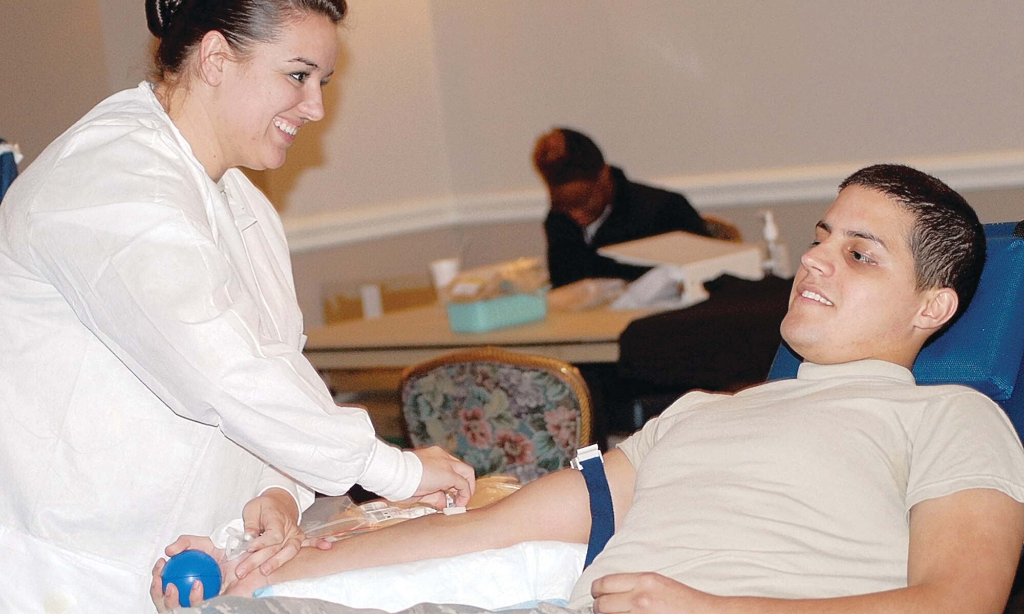 Airman 1st Class Jose Perez, 43rd Medical Support Squadron, gives blood at the Pope Club ballroom Oct. 15. All blood donated helps support servicemembers in the Area of Responsibility.