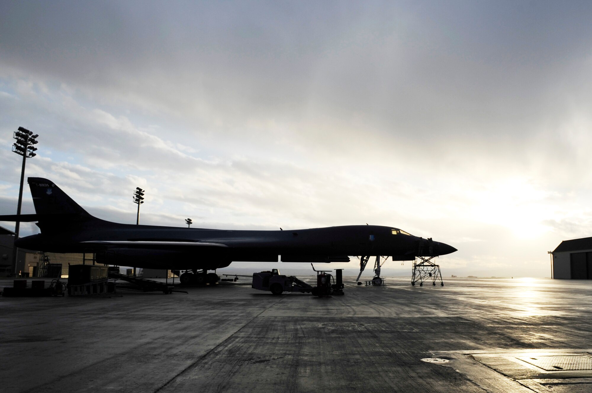 A B-1B Lancer sits on the Ellsworth Air Force Base, S.D., flightline, Oct. 15, 2009, before a training mission.  The B-1 can rapidly deliver massive quantities of precision and non-precision weapons against any adversary, anywhere in the world. (U.S. Air Force photo/Airman 1st Class Corey Hook)