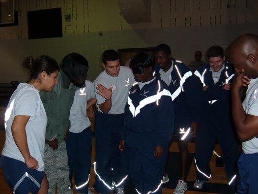 Team Pope participates in Wingman day activities Oct. 16. The day featured briefings on DUI ramifications, the dangers of texting while driving and the importance of suicide prevention. The day concluded with a small group break out session in which Team Pope discussed topics such as stress management and conflict resolution. (U.S. Air Force Photo Courtesy) 