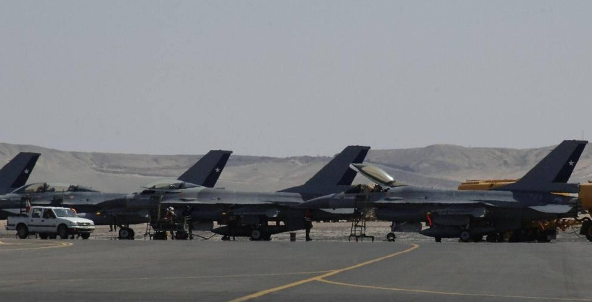 ANTOFAGASTA, Chile – F-16s of the Fuerza Aérea de Chile (FACh) prepare
for takeoff Oct. 23 during Exercise SALITRE II hosted by Chile. (U.S.
Air Force photo by Tech. Sgt. Eric Petosky)