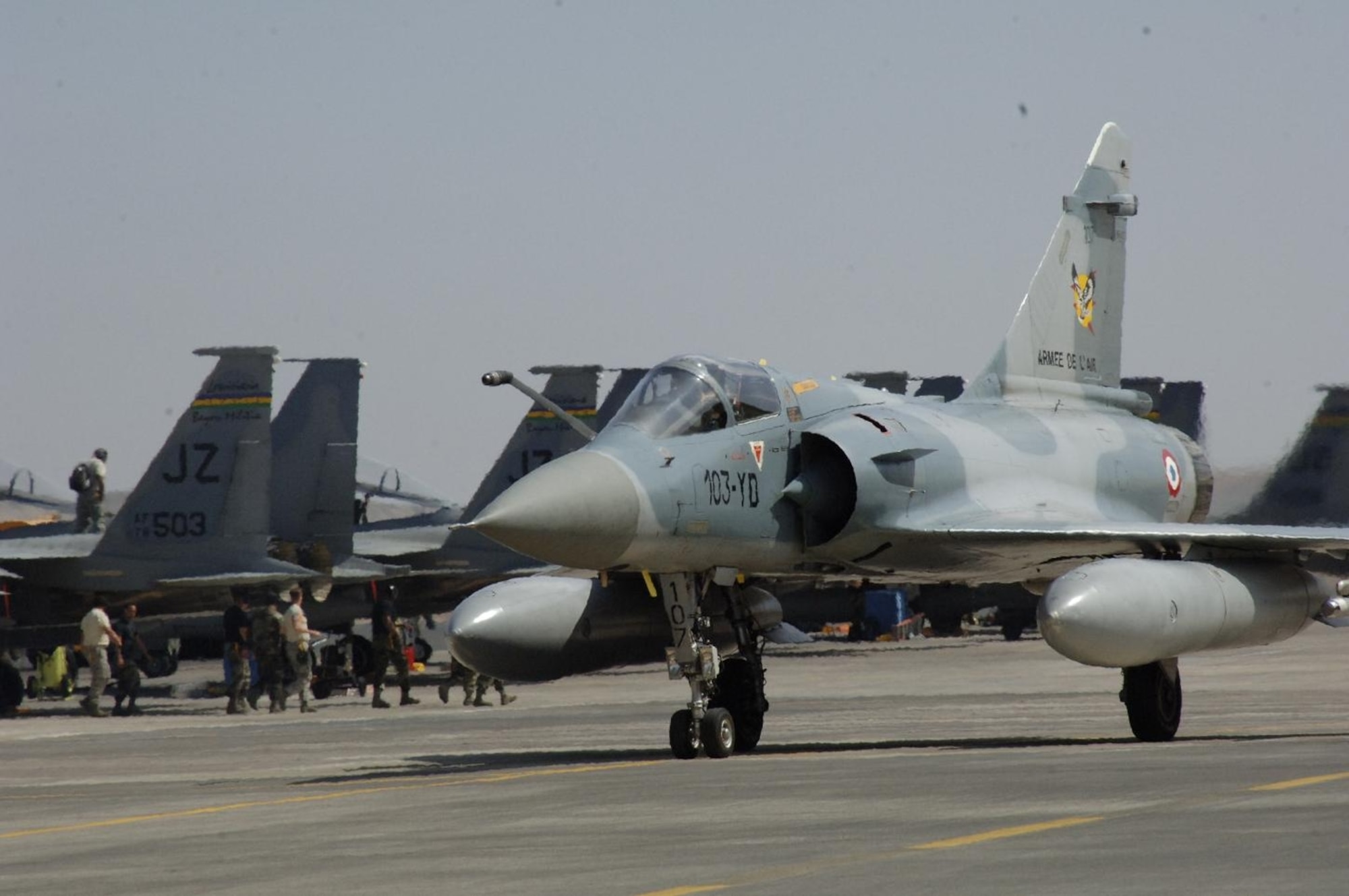 ANTOFAGASTA, Chile – A French Mirage taxis past U.S. F-15s from the
159th Fighter Wing Oct. 23 during Exercise SALITRE II hosted by Chile.
(U.S. Air Force photo by Tech. Sgt. Eric Petosky)