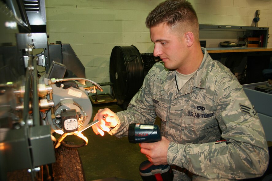 WRIGHT-PATTERSON AIR FORCE BASE, Ohio - Senior Airman Timothy Boris, 445th Maintenance Aerospace Ground Equipment Flight mechanic, repairs a New Generation Ground Heater, or NGH.  The wing possesses 43 heaters, which need to be prepared for the upcoming cold weather.  The heaters provide warmth for Airmen who must perform their mission outdoors, such as the gate security guards and Airmen working on the flightline. (U. S. Air Force photo/Senior Airman Mikhail Berlin)