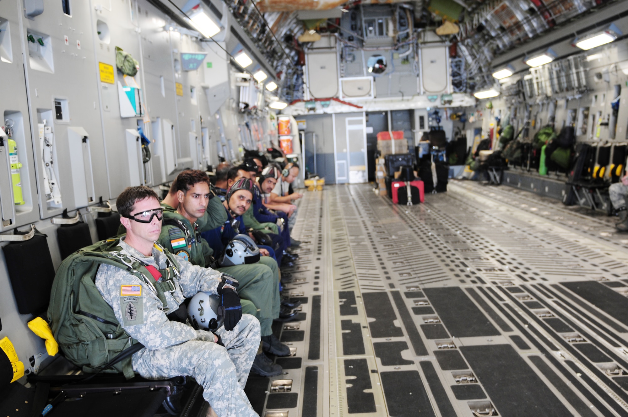 Special operations forces from the United States and India prepare to jump out of a C-17 Globemaster III, during the first combined high-altitude low-opening mission of exercise Cope India Oct. 19, 2009. Cope India is a humanitarian assistance disaster relief exercise. (U.S. Air Force photo/Capt. Genieve David)