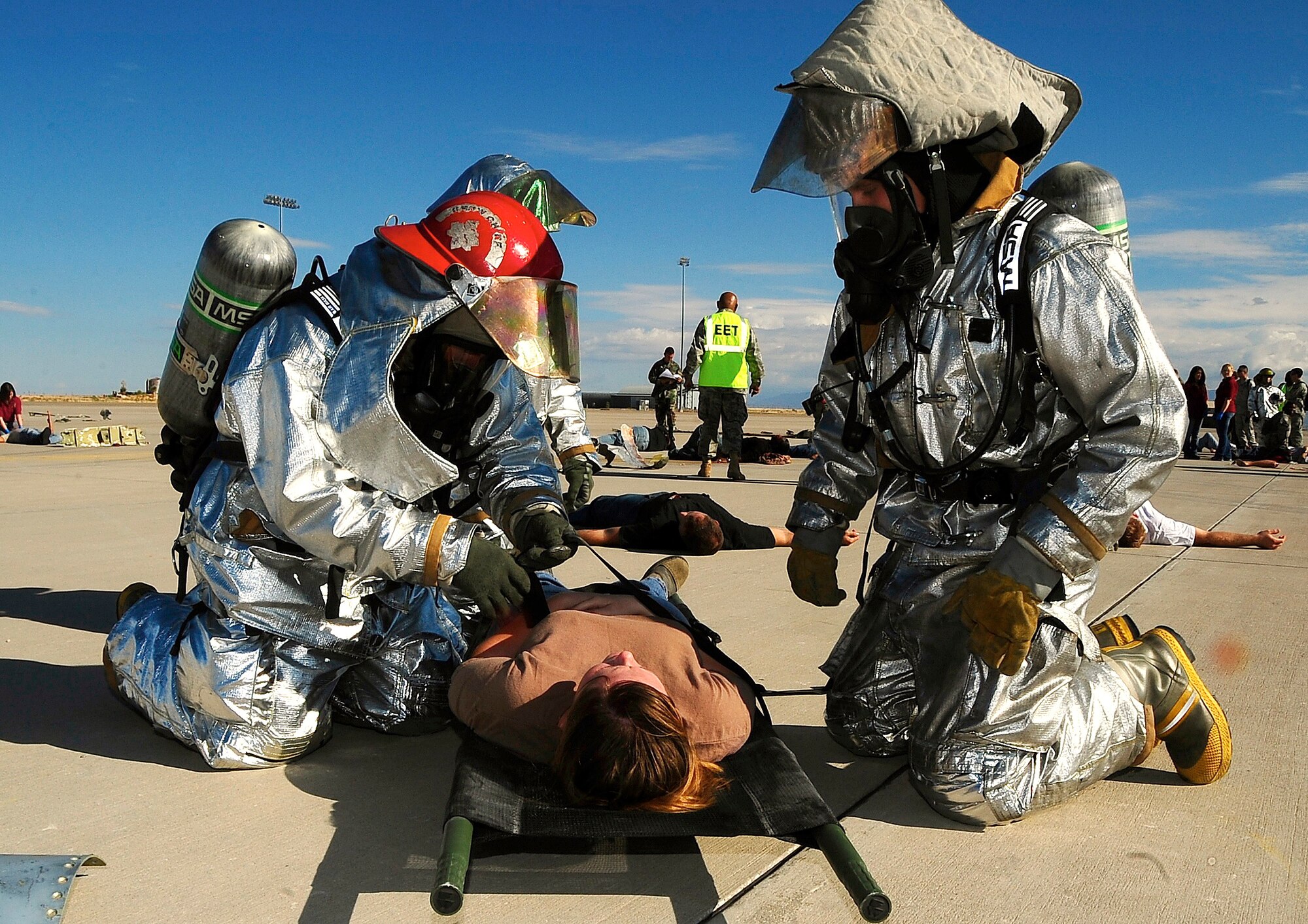 HOLLOMAN AIR FORCE BASE, N.M. -- Fire and emergency service personnel respond to a simulated aircraft accident here Oct. 20 during a Major Accident Response Exercise. First responders tested their ability to react quickly and correctly if an accident were to occur. The exercise was conducted in preparation for the base's Open House Oct. 24. (U.S. Air Force photo by Tech. Sgt. Chris Flahive)